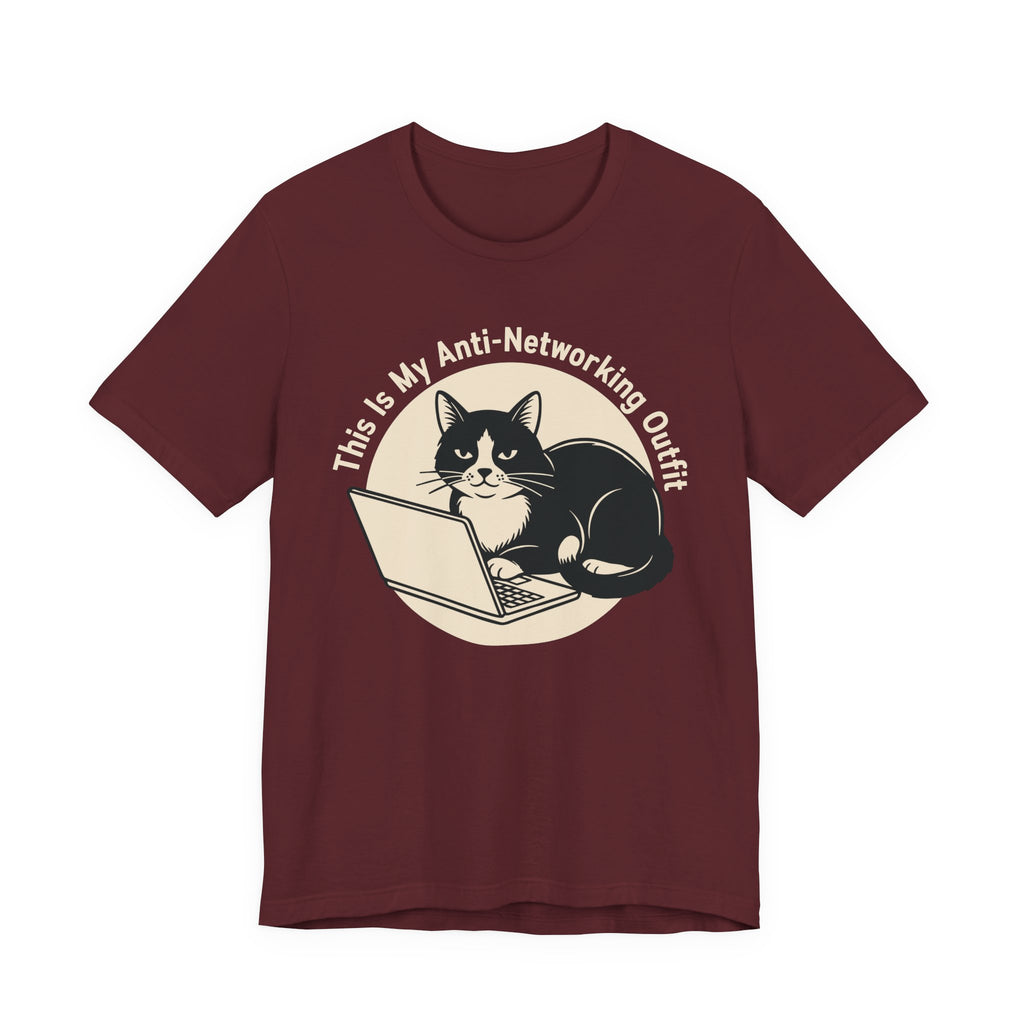 A maroon tee with Black-and-white cat at a laptop beneath “This Is My Anti-Networking Outfit” in a circular retro design