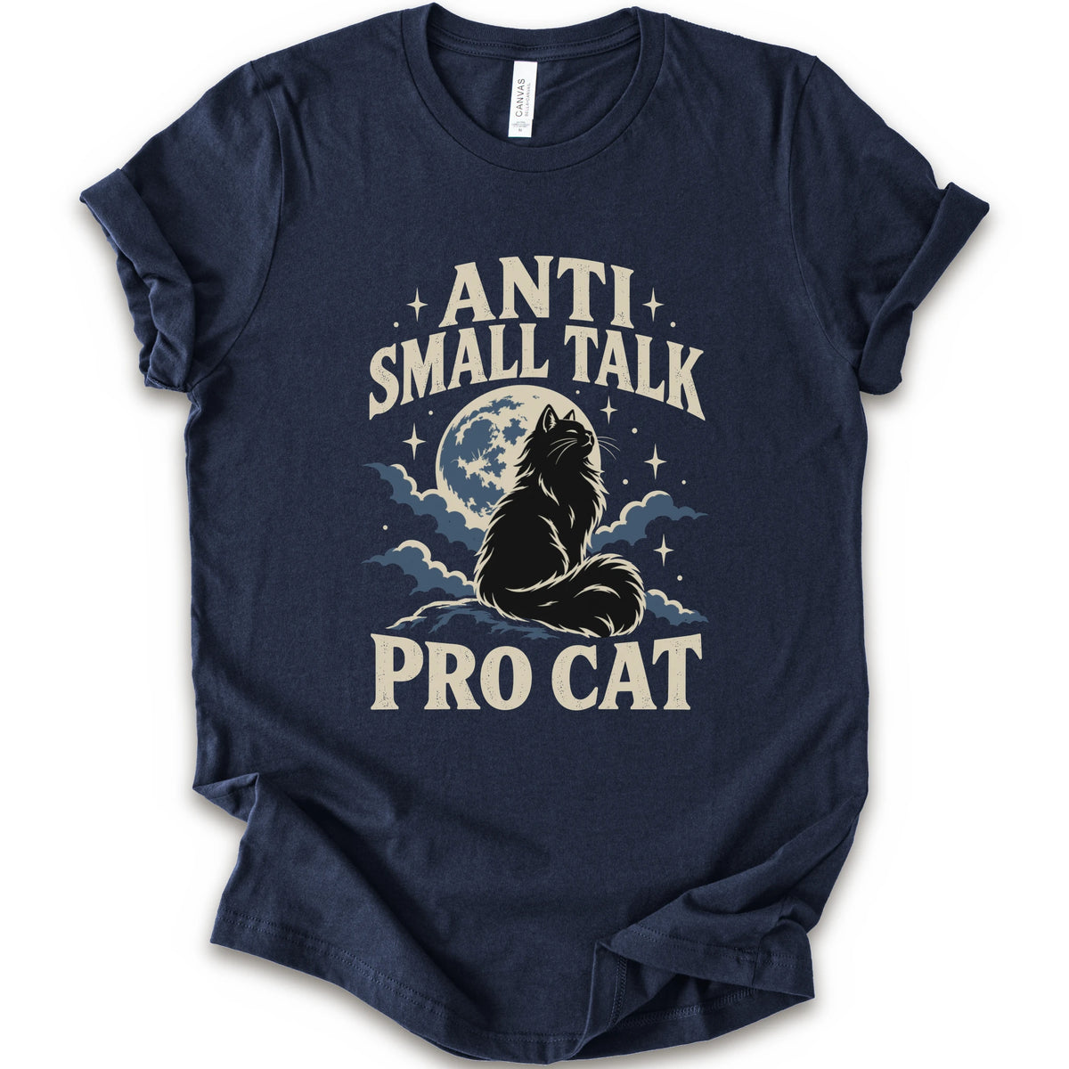 A navy short-sleeve t-shirt with a graphic print featuring a cat silhouette in front of a full moon and clouds, with the text 'ANTI SMALL TALK PRO CAT' in a cream-colored font.