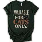 A forest short-sleeve t-shirt with a distressed graphic that reads 'AVAILABLE FOR CATS ONLY.' in beige and brown-orange lettering, featuring a black cat illustration.