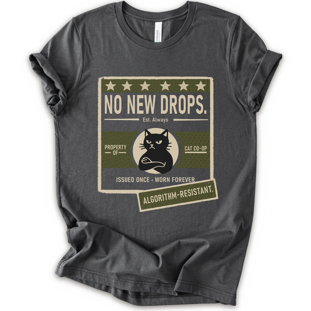 A asphalt short-sleeve crewneck t-shirt with a vintage-style graphic print on the front. The graphic features a distressed beige and olive green box with the text 'NO NEW DROPS.