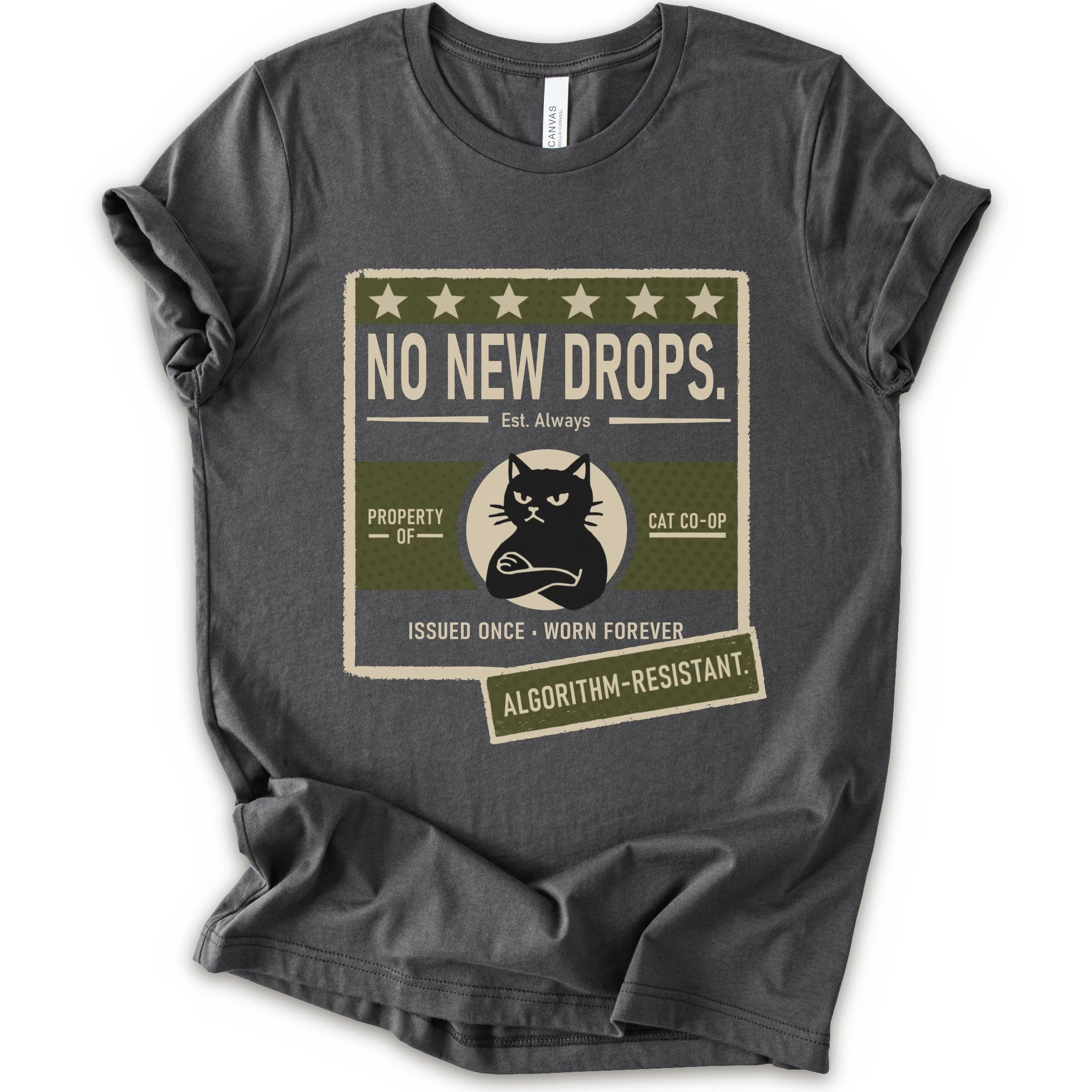 A asphalt short-sleeve crewneck t-shirt with a vintage-style graphic print on the front. The graphic features a distressed beige and olive green box with the text 'NO NEW DROPS.