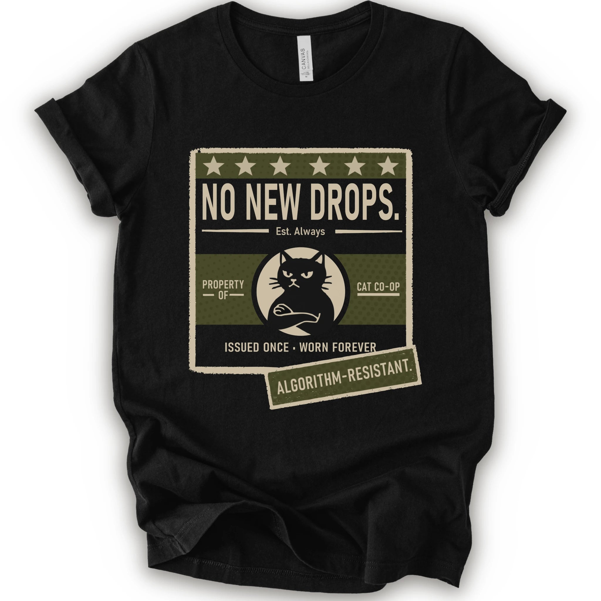 A black short-sleeve crewneck t-shirt with a vintage-style graphic print on the front. The graphic features a distressed beige and olive green box with the text 'NO NEW DROPS.