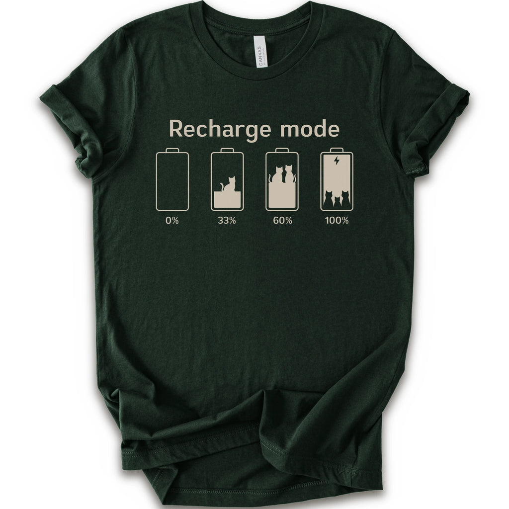 A forest short-sleeve crewneck t-shirt with a graphic print on the front. The graphic features the text 'Recharge mode' above four battery icons showing battery levels from 0% to 100% with a cat silhouette inside the batteries.