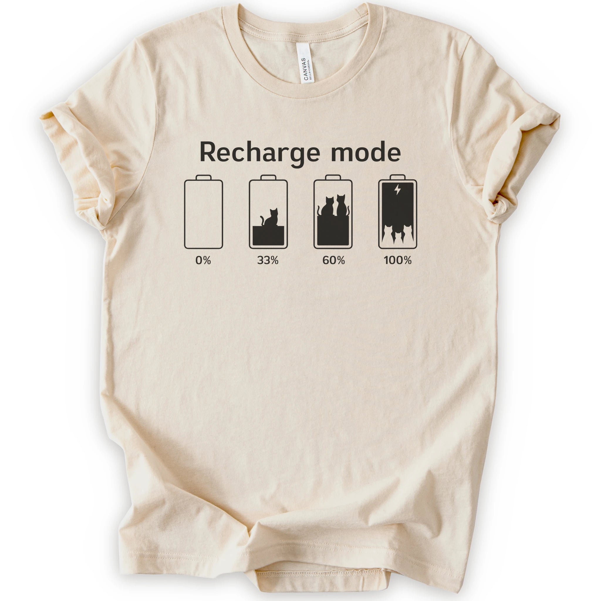 A natural short-sleeve crewneck t-shirt with a graphic print on the front. The graphic features the text 'Recharge mode' above four battery icons showing battery levels from 0% to 100% with a cat silhouette inside the batteries.