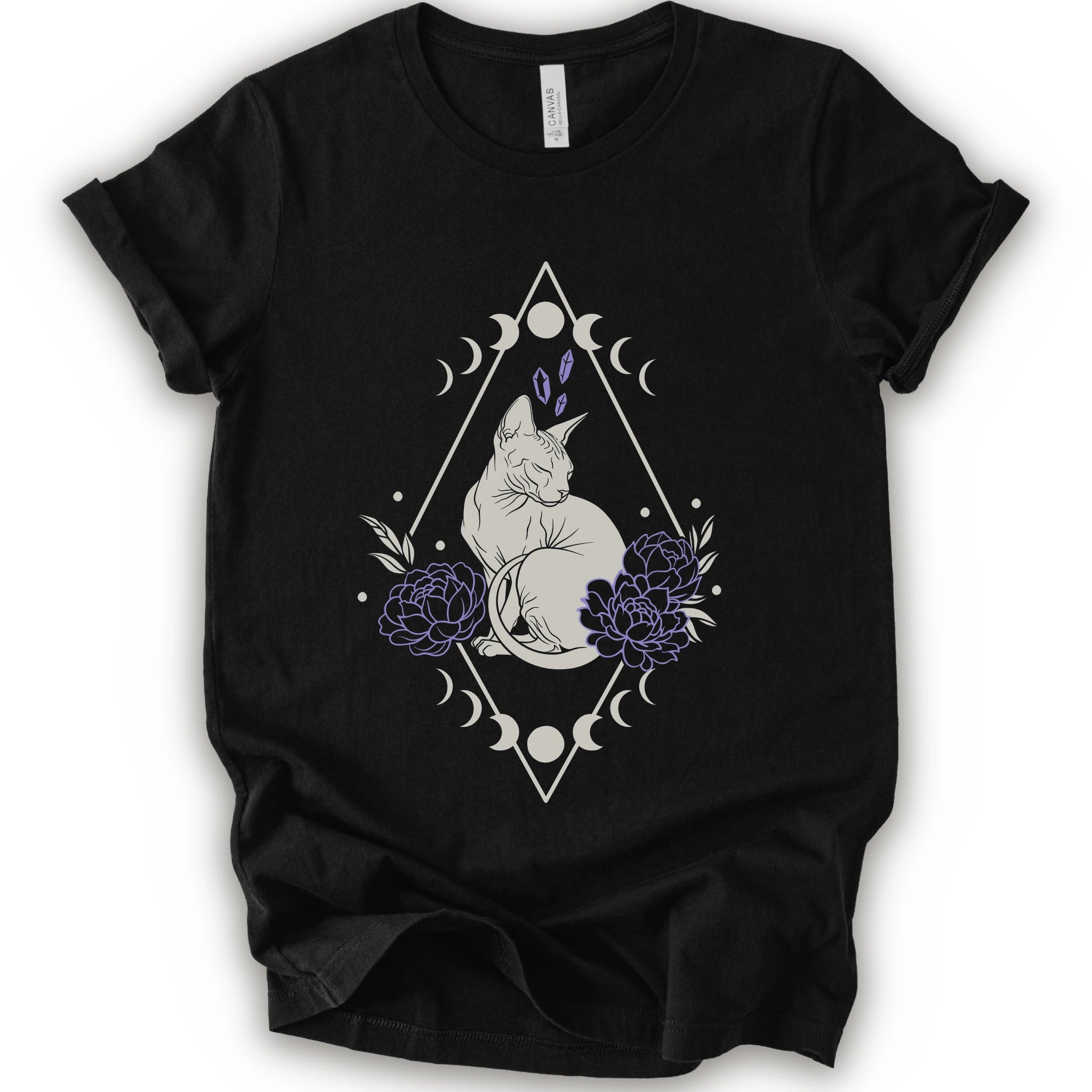 Black graphic t-shirt with white Sphynx cat with lavender flowers, crystals, moon phases and a geometric celestial frame