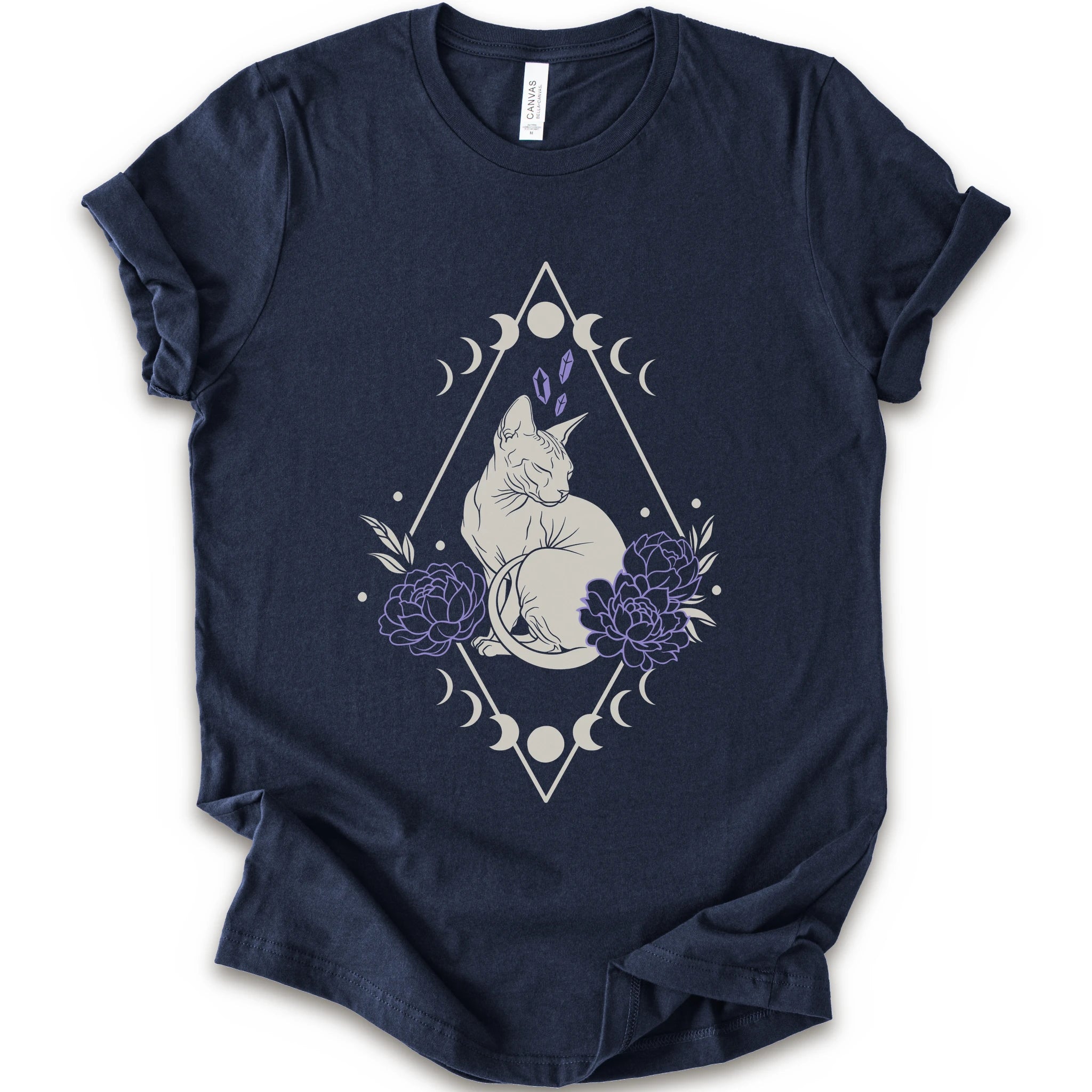 Navy graphic t-shirt with white Sphynx cat with lavender flowers, crystals, moon phases and a geometric celestial frame