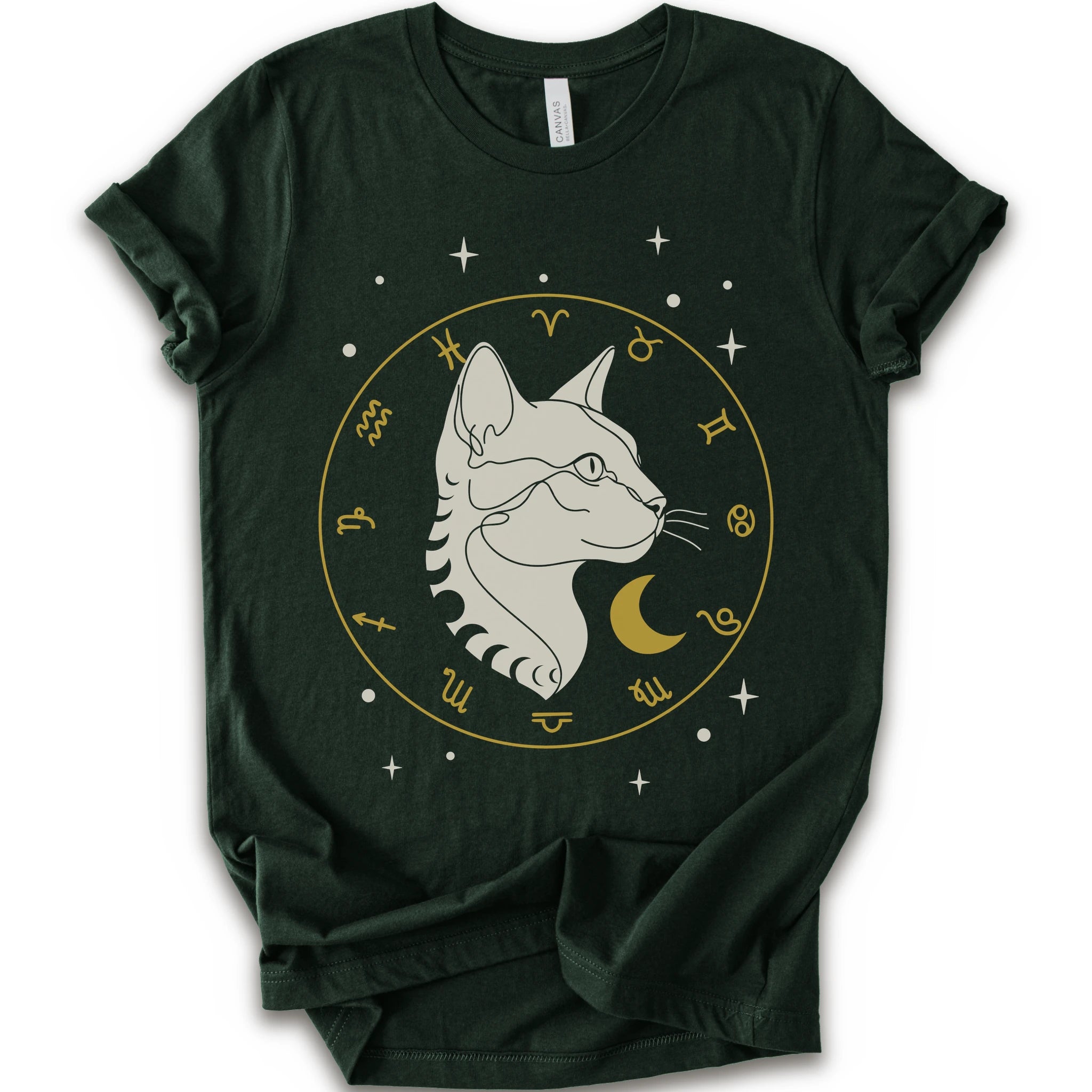 A forest short-sleeve crewneck t-shirt featuring a graphic of a white cat profile inside a gold zodiac wheel with a crescent moon and stars.