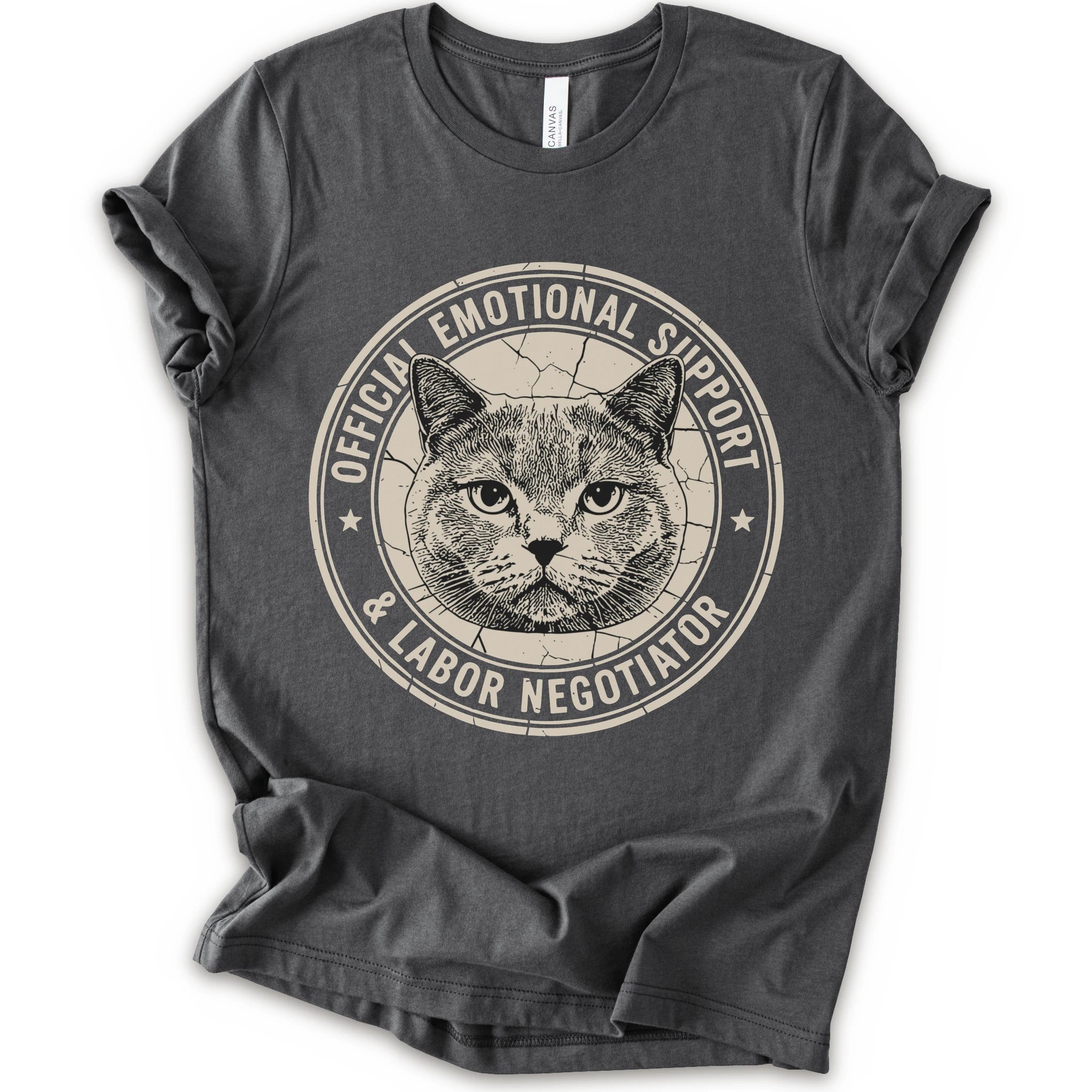 A asphalt short-sleeve crewneck t-shirt with a distressed circular graphic on the chest featuring a cat's face and the text 'OFFICIAL EMOTIONAL SUPPORT & LABOR NEGOTIATOR'.