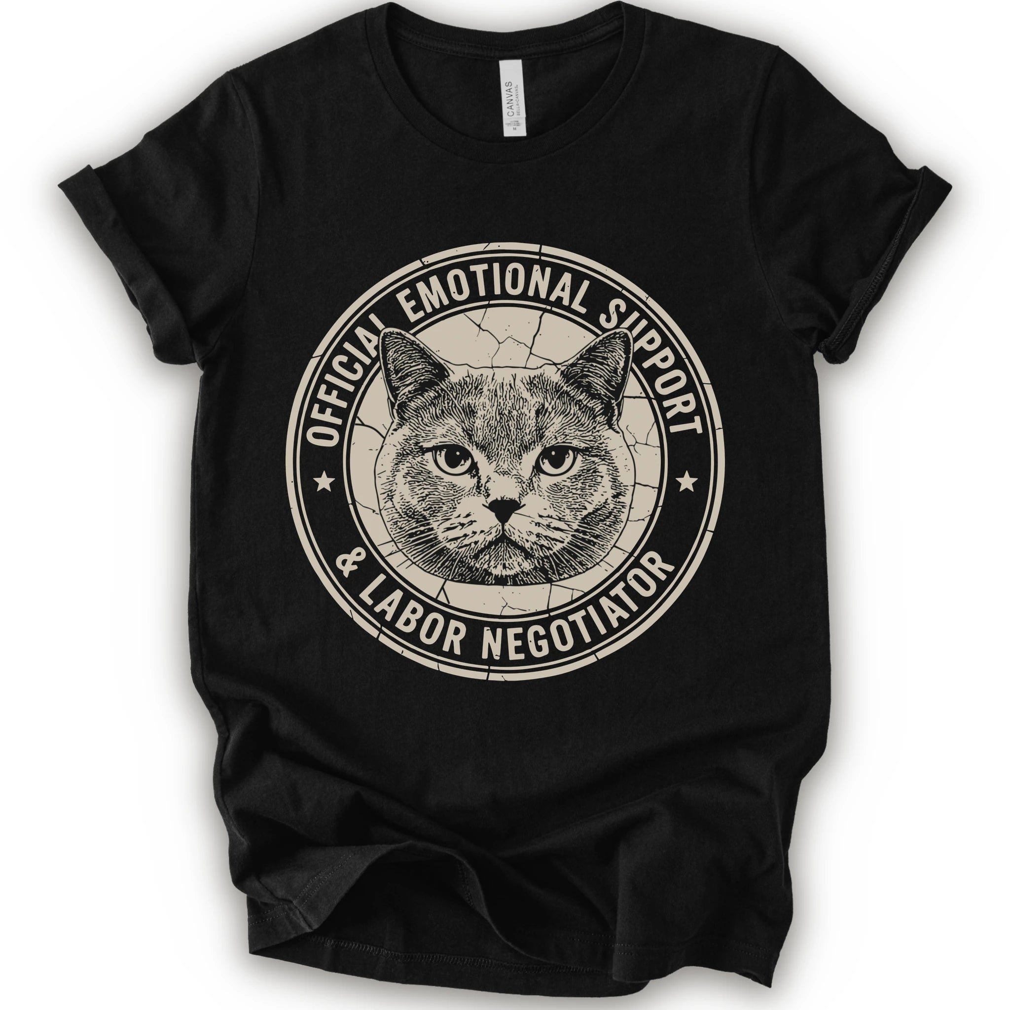 A black short-sleeve crewneck t-shirt with a distressed circular graphic on the chest featuring a cat's face and the text 'OFFICIAL EMOTIONAL SUPPORT & LABOR NEGOTIATOR'.