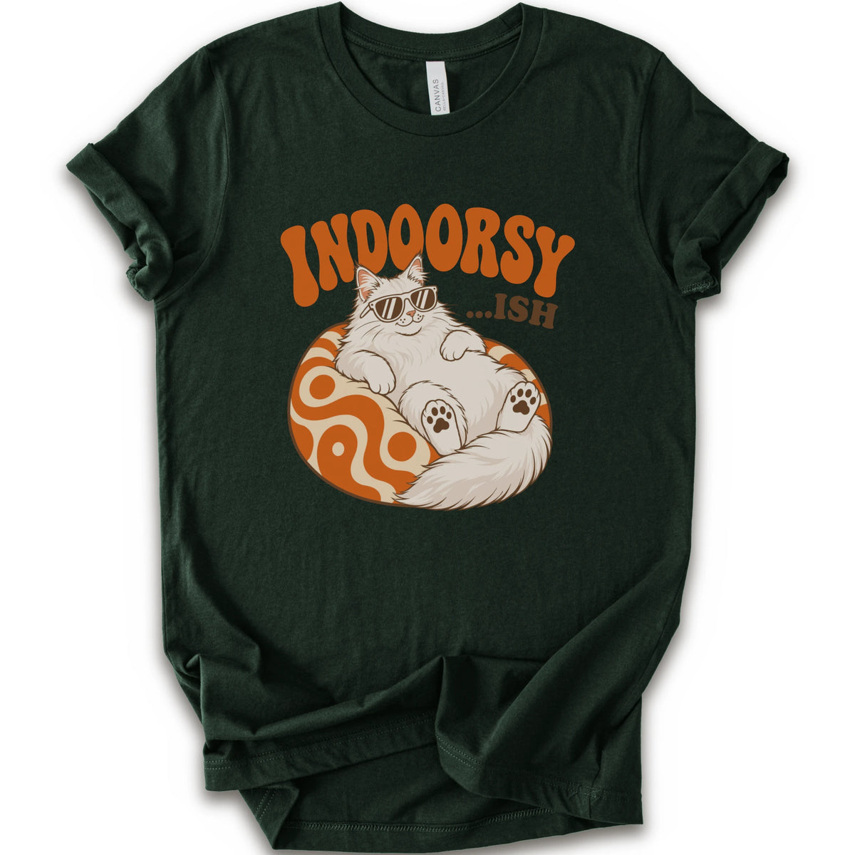 A forest short-sleeve t-shirt with a graphic of a white cat wearing sunglasses on an orange patterned ball, with the text 'INDOORSY... .ish'.