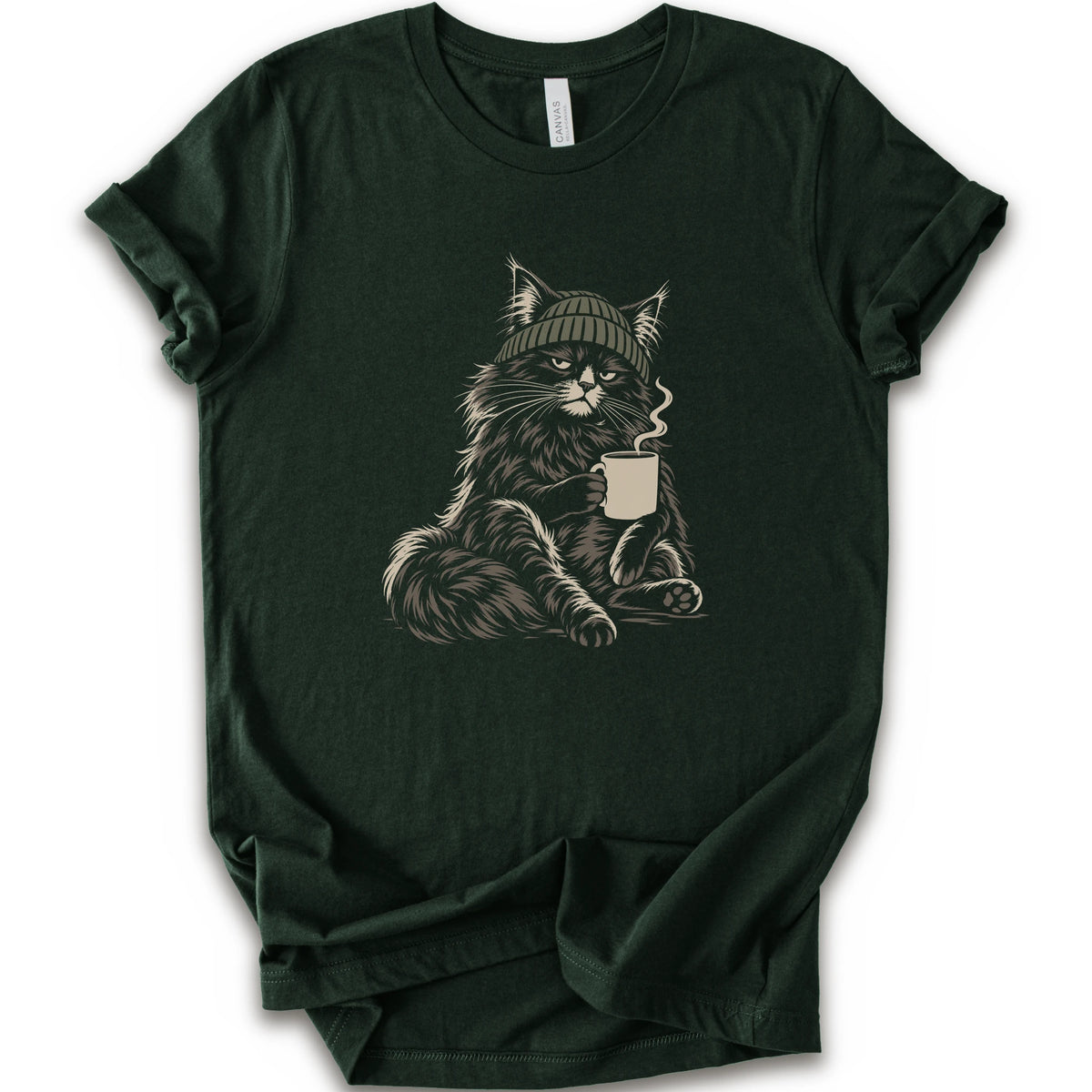 A forest short-sleeve t-shirt with a graphic of a fluffy cat wearing a green beanie and holding a mug, displayed.