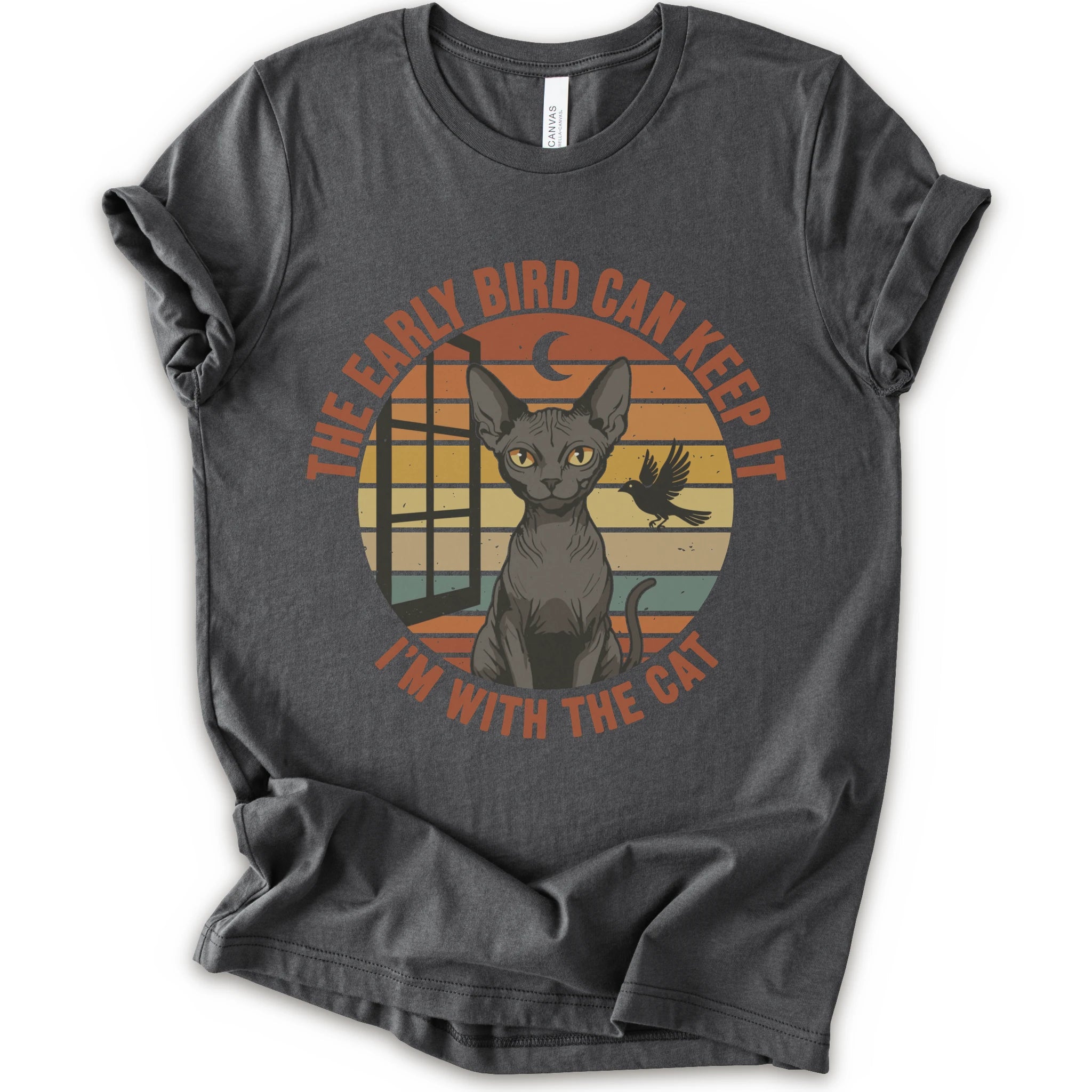 A asphalt short-sleeve crewneck t-shirt with a graphic print of a hairless cat in front of a retro sunset circle, with the text 'THE EARLY BIRD CAN KEEP IT I'M WITH THE CAT'.