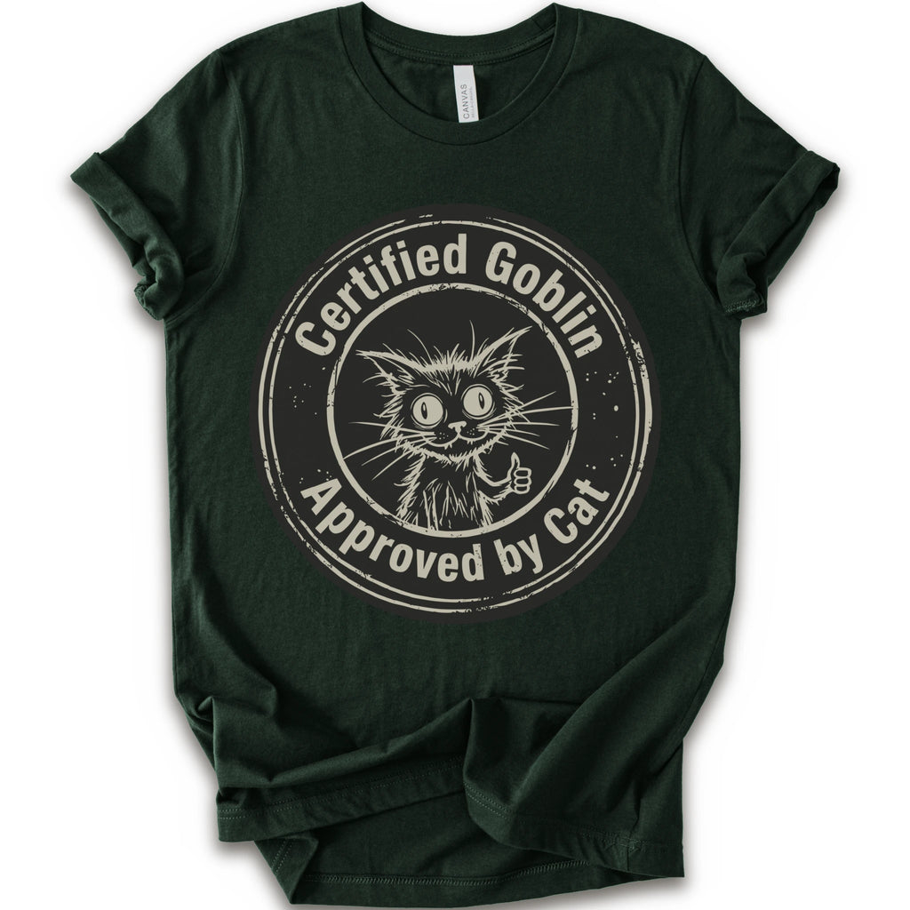 A forest crewneck t-shirt with a distressed beige-black circular graphic that reads 'Certified Goblin Approved by Cat' around an illustration of a cat giving a thumbs-up.