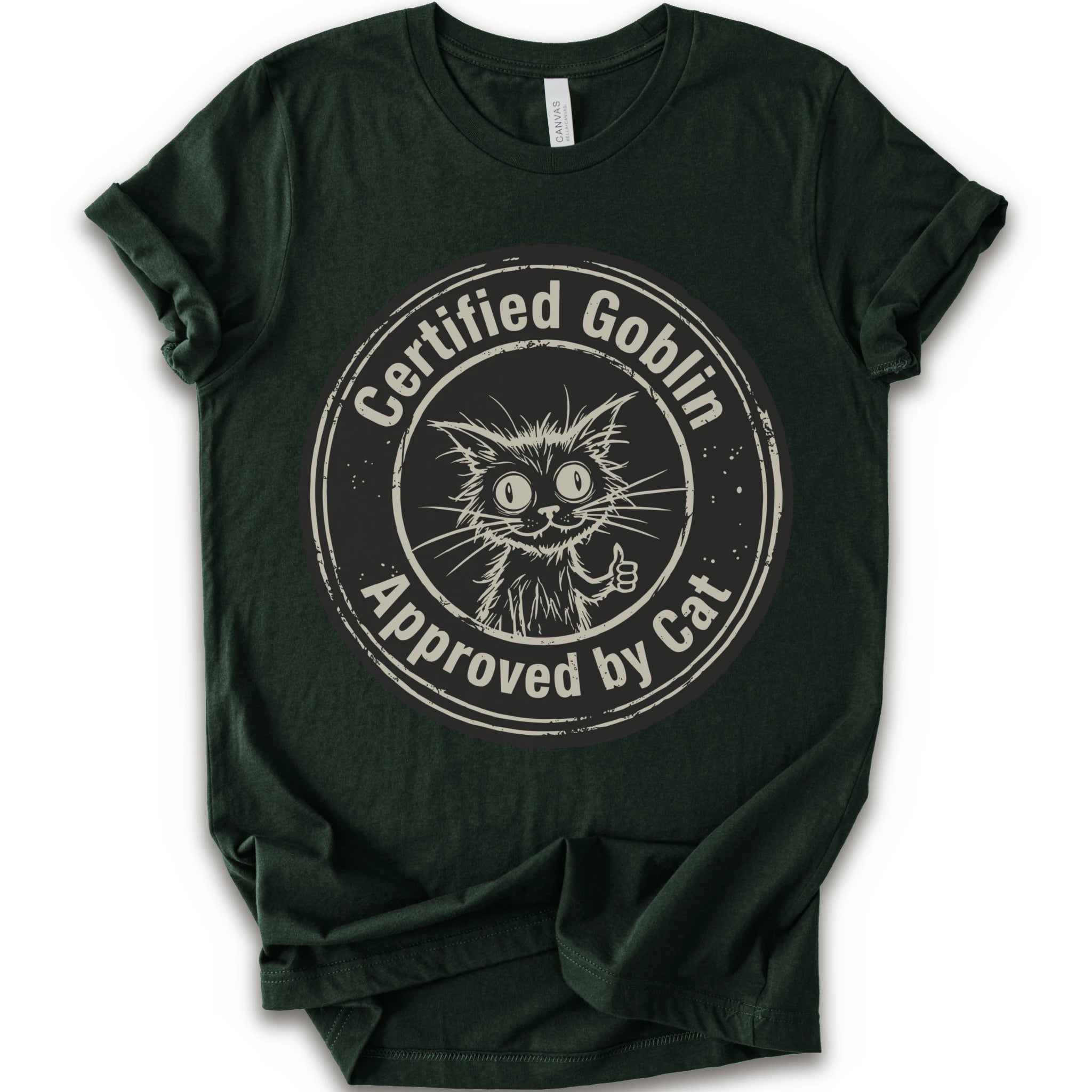 A forest crewneck t-shirt with a distressed beige-black circular graphic that reads 'Certified Goblin Approved by Cat' around an illustration of a cat giving a thumbs-up.