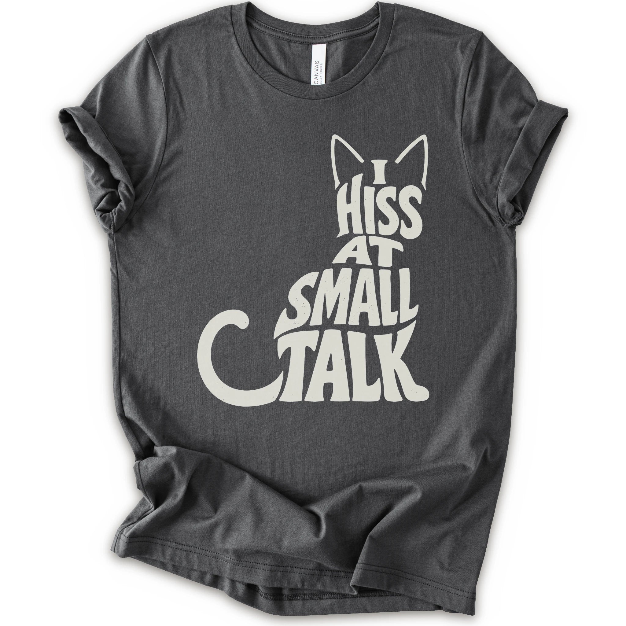 Asphalt graphic t-shirt with off-white “I Hiss at Small Talk” typography with pointed cat ears and a large curved tail