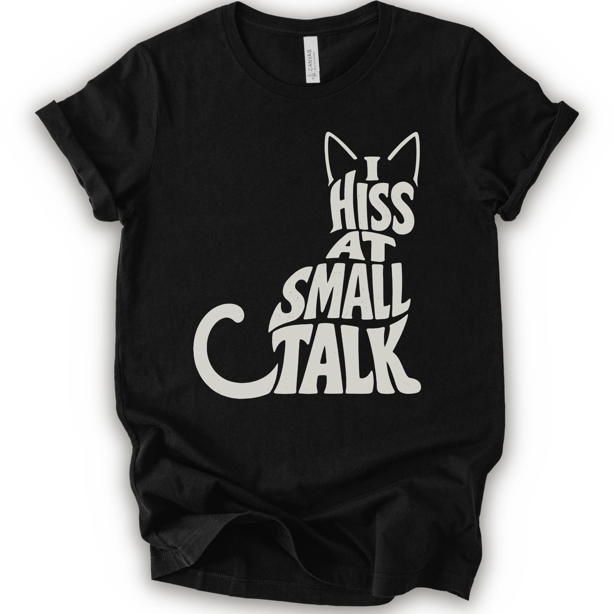 Black graphic t-shirt with off-white “I Hiss at Small Talk” typography with pointed cat ears and a large curved tail