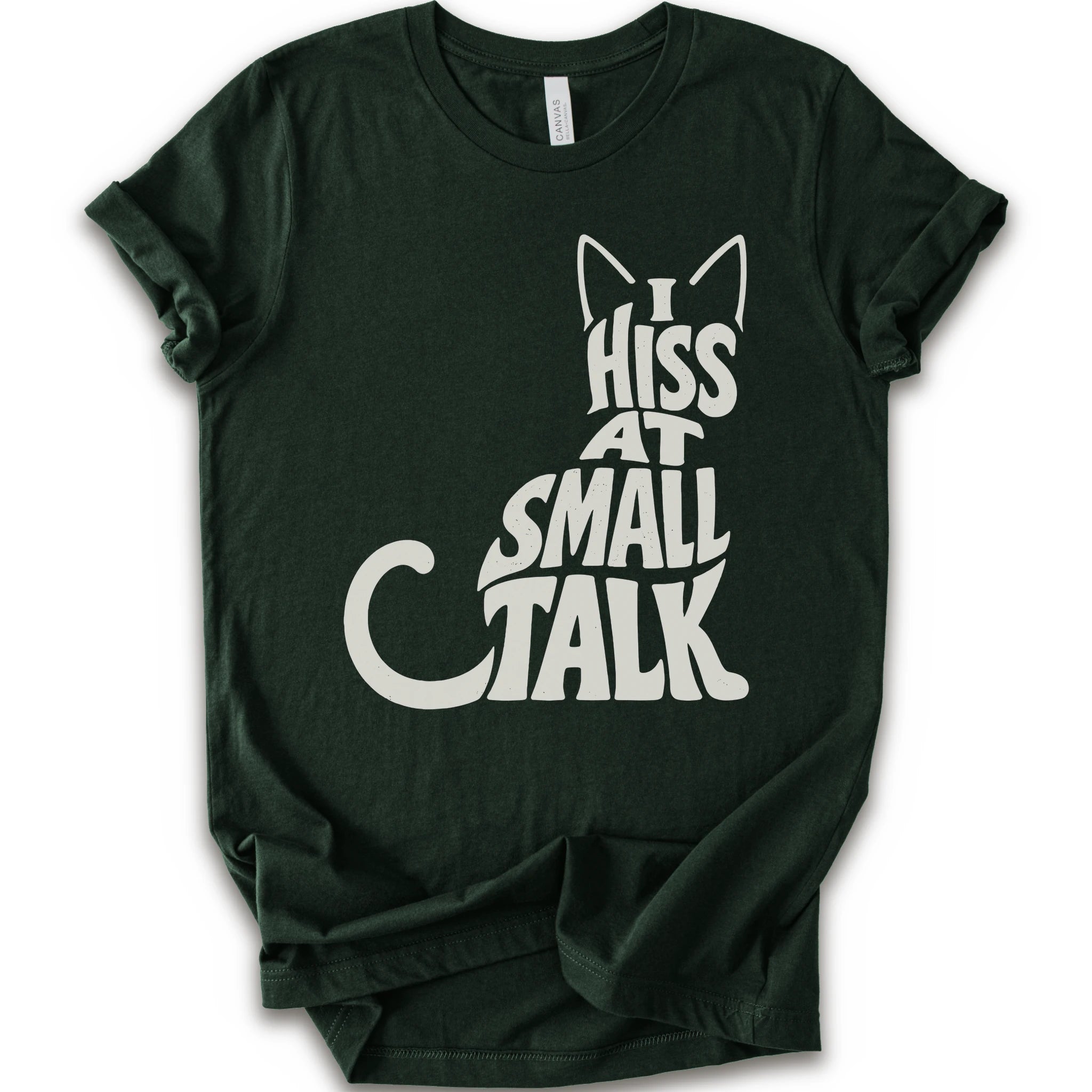 Forest graphic t-shirt with off-white “I Hiss at Small Talk” typography with pointed cat ears and a large curved tail