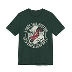 Green Tee with Retro badge reading “I Hope This Meeting Gets Canceled by My Cat” with a cat, calendar, and claw marks