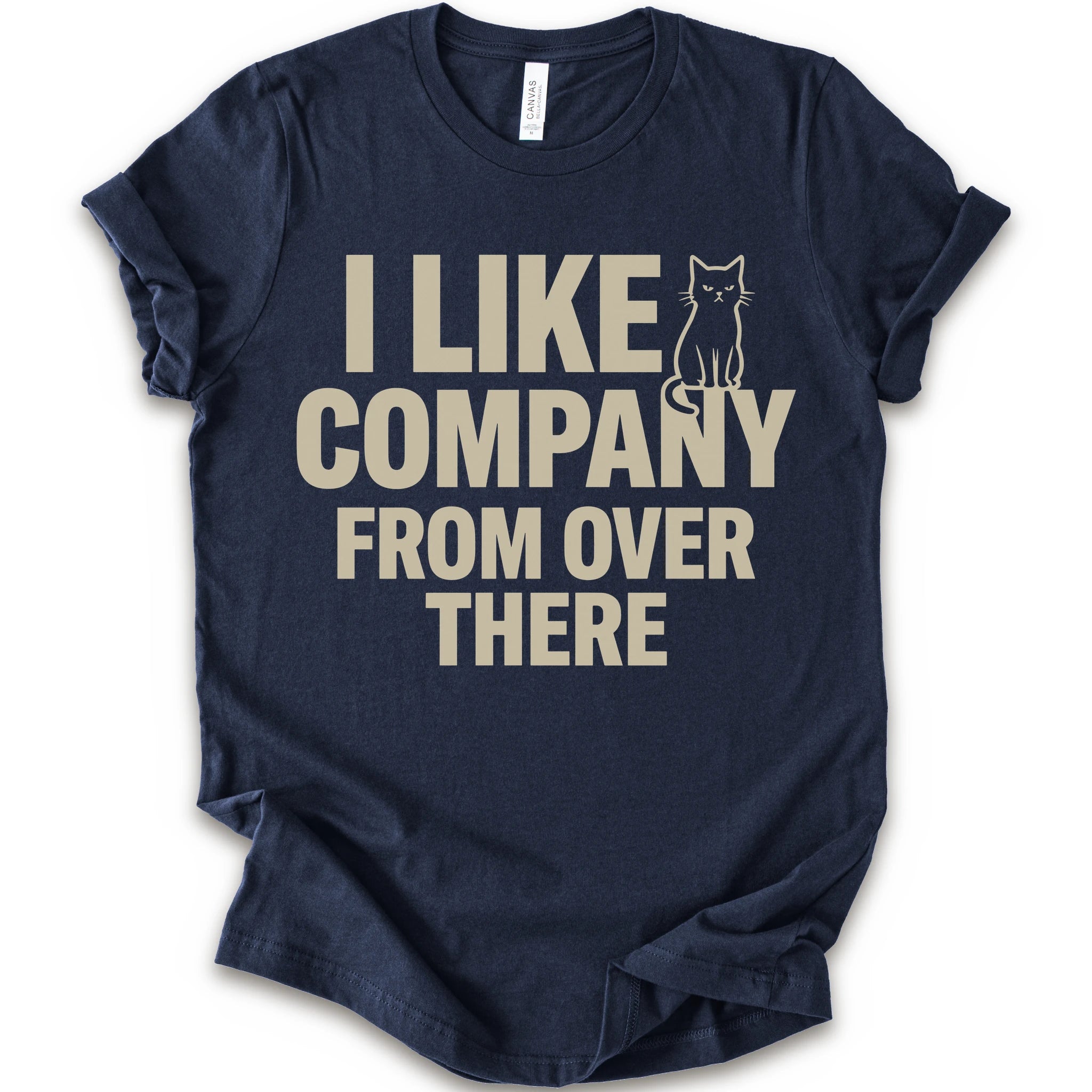 Navy graphic t-shirt with "I Like Company From Over There" text with an unimpressed sitting cat in a bold stacked T-shirt design