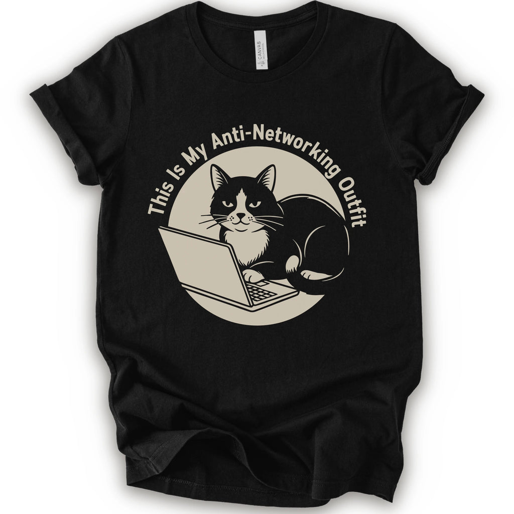 A black T-shirt with a “This Is My Anti-Networking Outfit” curves above a black-and-white cat sitting at an open laptop. The artwork uses a clean circular badge layout with a limited black-and-cream palette.