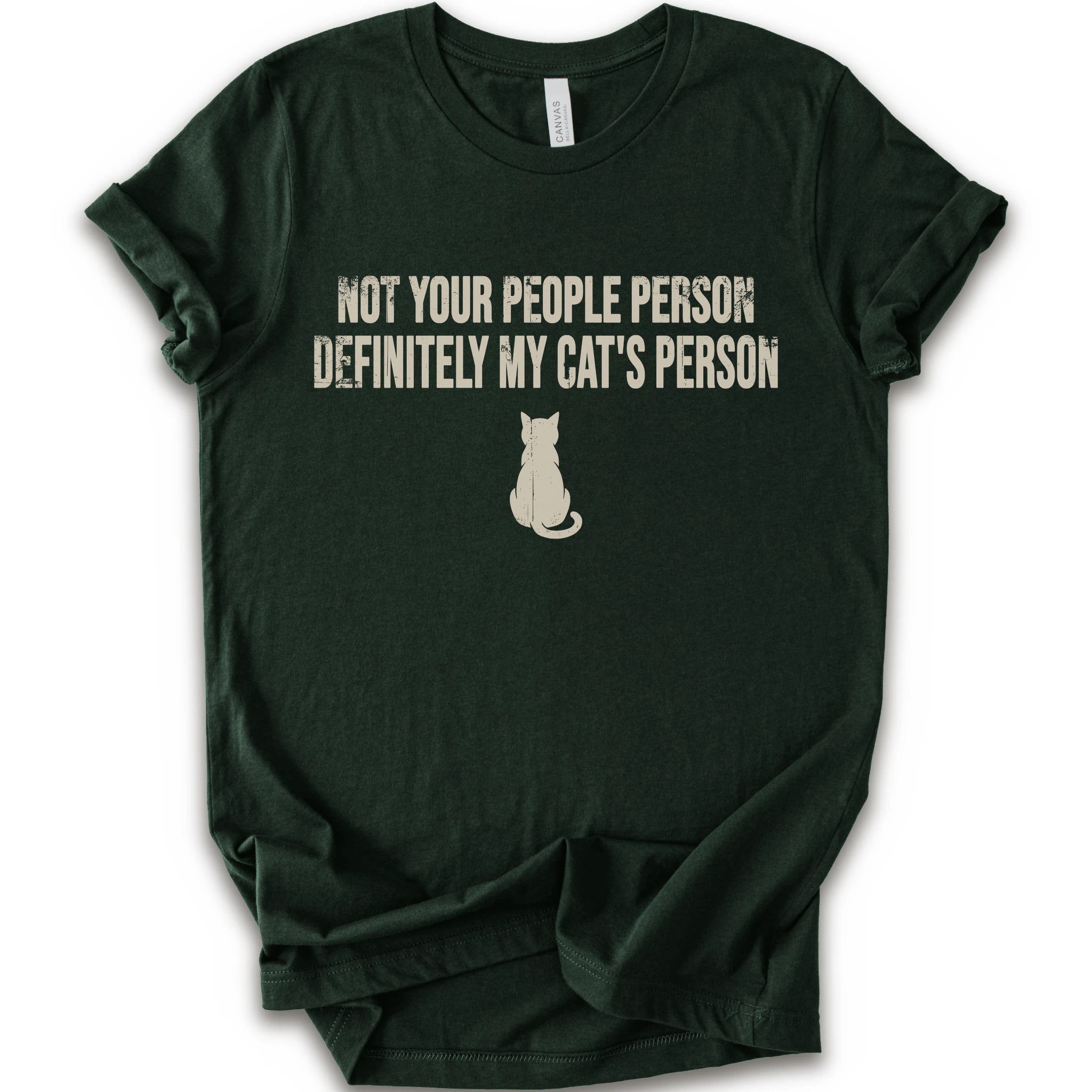 A forest short-sleeve crewneck t-shirt with a beige graphic print that reads 'NOT YOUR PEOPLE PERSON DEFINITELY MY CAT'S PERSON' above a small cat silhouette.
