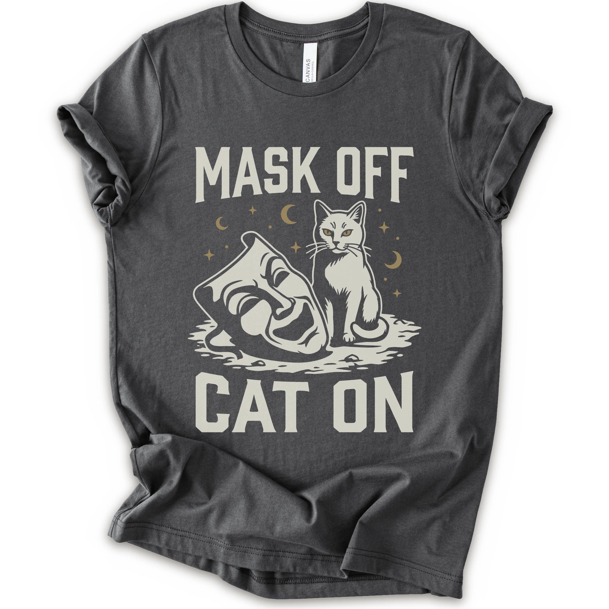 A asphalt short-sleeve crewneck t-shirt with a white graphic with gold moons and stars of a cat with a mask surrounded by the text 'MASK OFF' and 'CAT ON'.