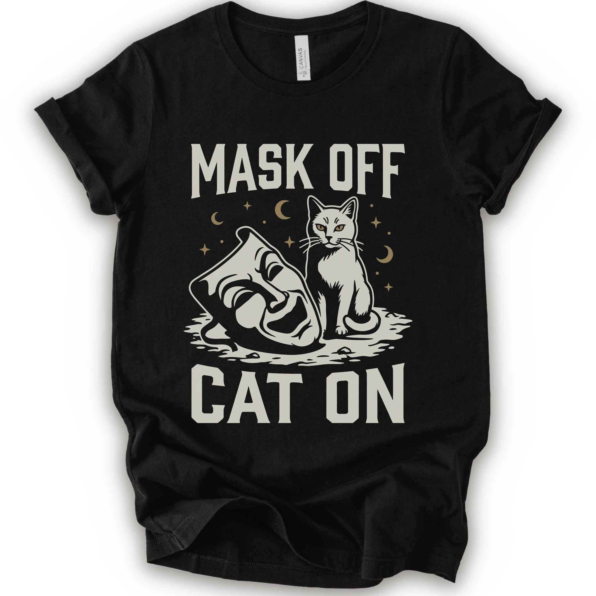 A black short-sleeve crewneck t-shirt with a white graphic with gold moons and stars of a cat with a mask surrounded by the text 'MASK OFF' and 'CAT ON'.