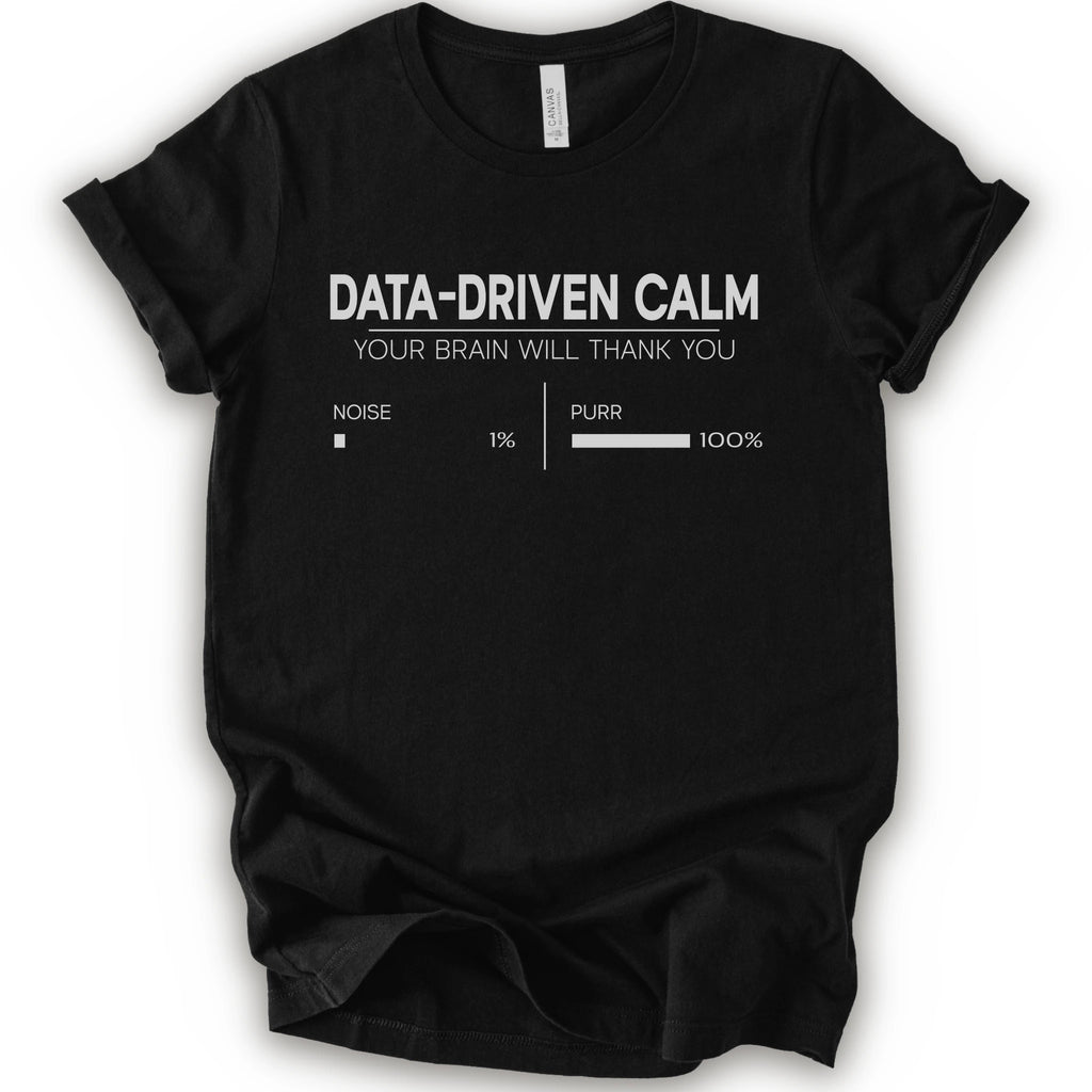 A black short-sleeve crewneck t-shirt with a white graphic print that reads 'DATA-DRIVEN CALM YOUR BRAIN WILL THANK YOU' above a progress bar labeled 'NOISE 1% | PURR 100%'.