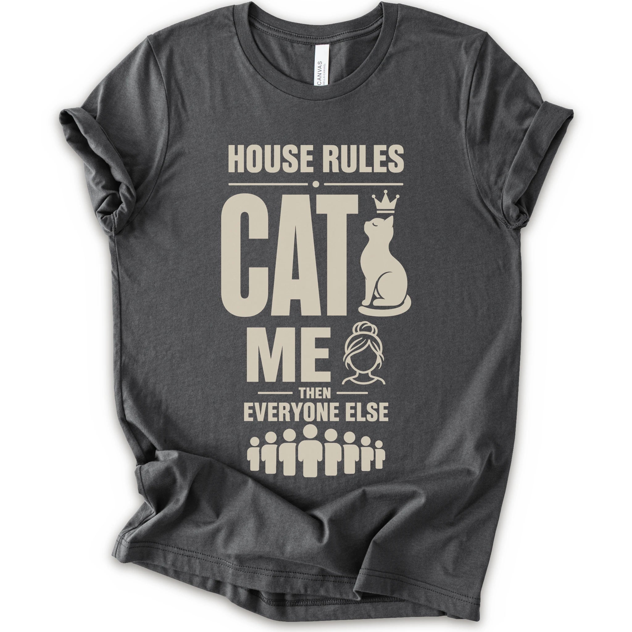 A asphalt short-sleeve crewneck t-shirt with a beige graphic print that reads 'HOUSE RULES CAT ME THEN EVERYONE ELSE' accompanied by illustrations of a cat wearing a crown and stick-figure family members.