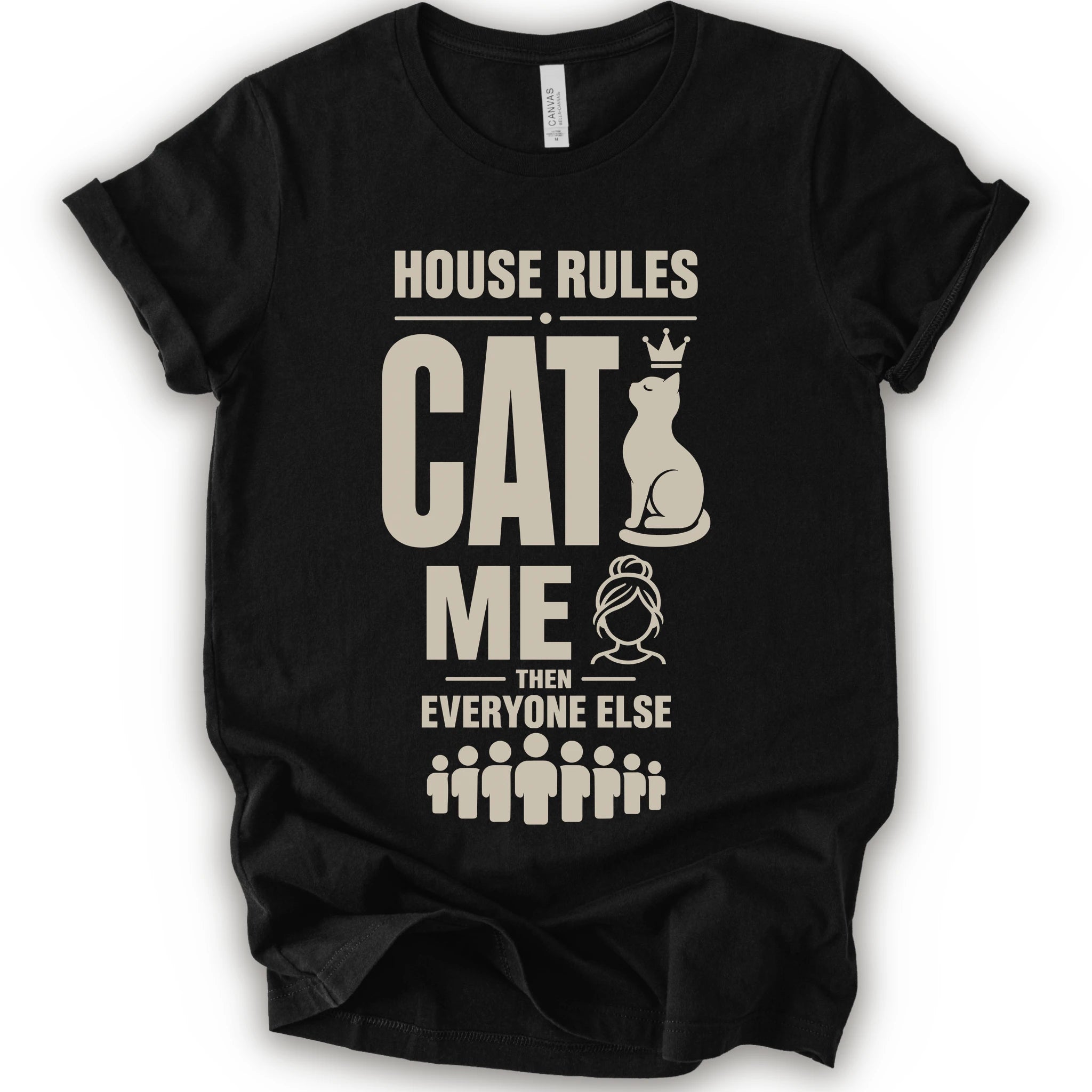 A black short-sleeve crewneck t-shirt with a beige graphic print that reads 'HOUSE RULES CAT ME THEN EVERYONE ELSE' accompanied by illustrations of a cat wearing a crown and stick-figure family members.