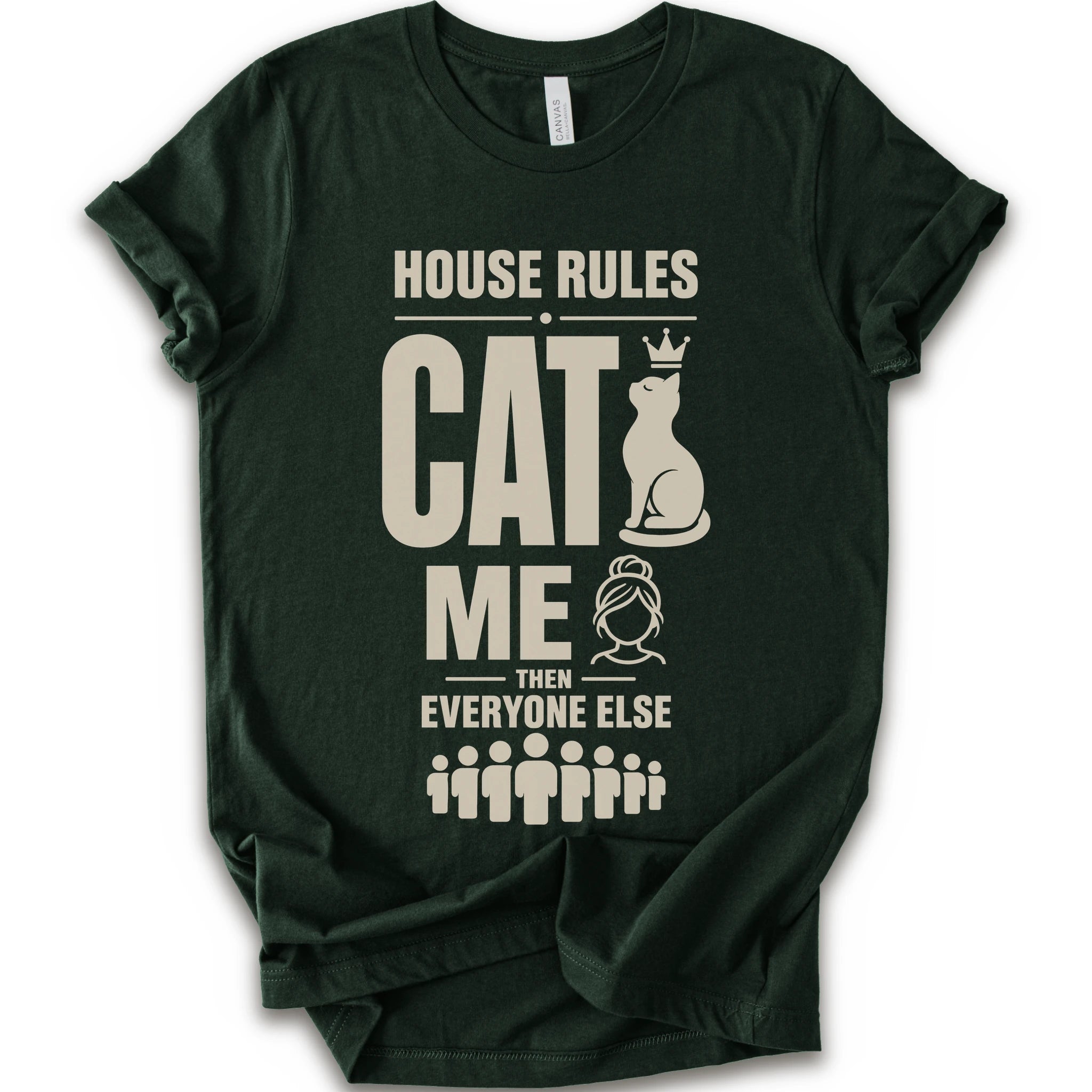 A forest short-sleeve crewneck t-shirt with a beige graphic print that reads 'HOUSE RULES CAT ME THEN EVERYONE ELSE' accompanied by illustrations of a cat wearing a crown and stick-figure family members.