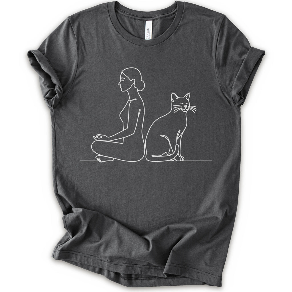 An asphalt short-sleeve crewneck t-shirt with a minimalist white line art graphic of a woman in a meditation pose next to a cat.