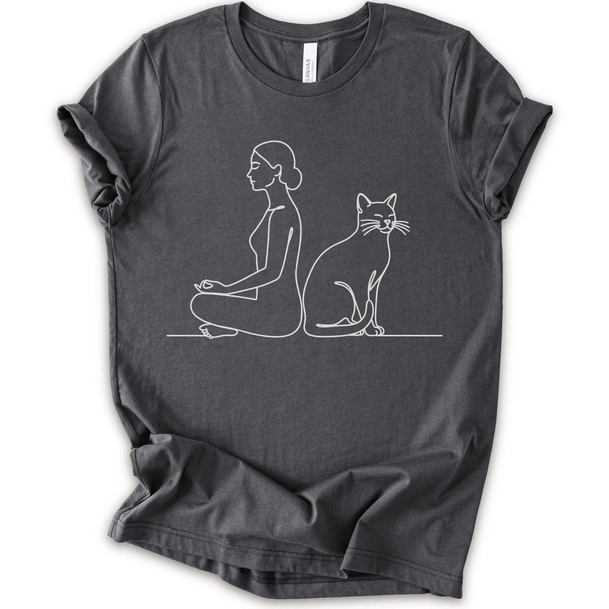 An asphalt short-sleeve crewneck t-shirt with a minimalist white line art graphic of a woman in a meditation pose next to a cat.