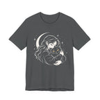 Grey tee with Woman embracing a fluffy cat beneath a crescent moon and stars, drawn in cream lines with golden cat eyes