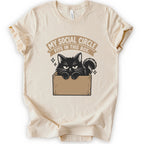 A natural short-sleeve crewneck t-shirt with a graphic print of a black cat in a cardboard box and the text 'MY SOCIAL CIRCLE FITS IN THIS BOX."