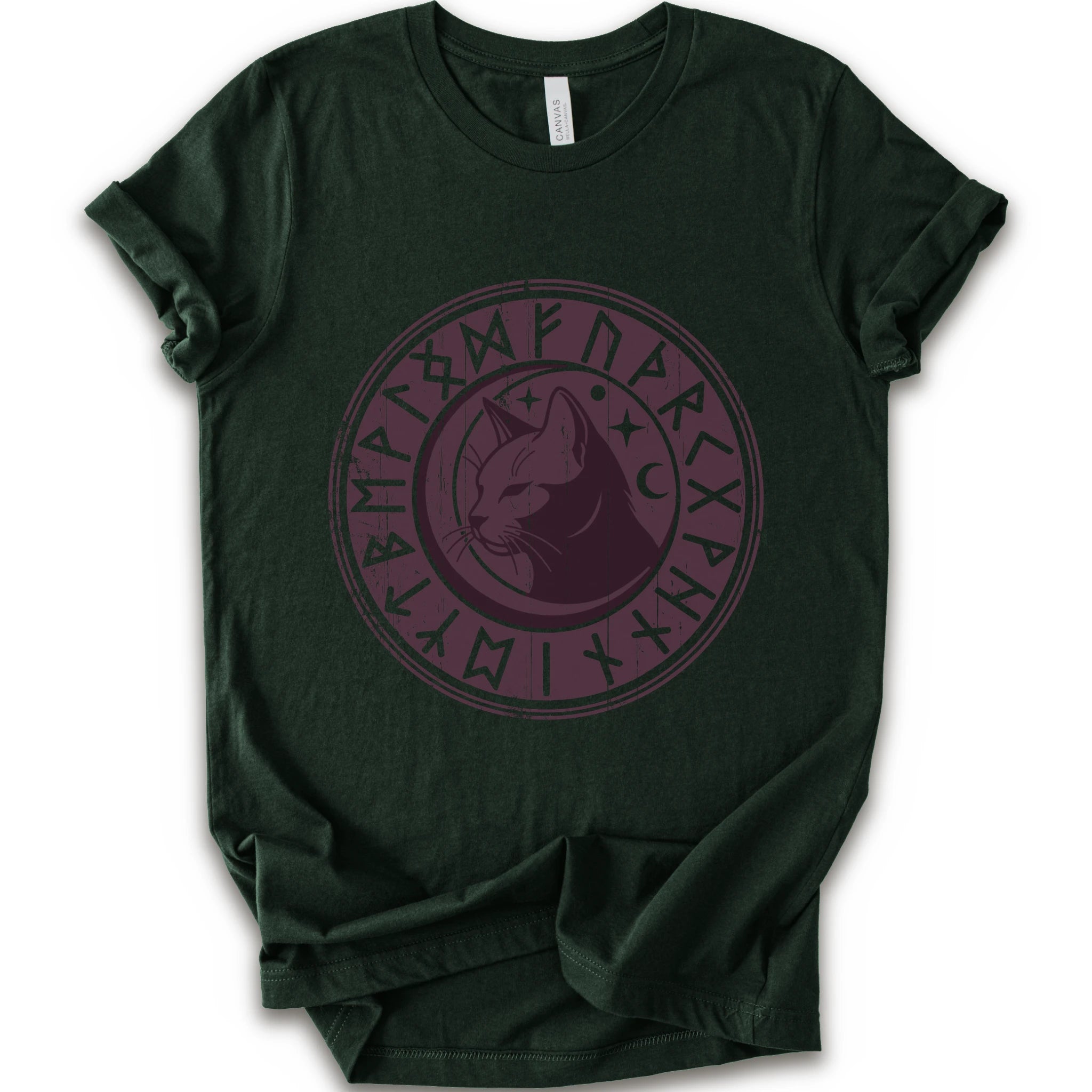 A forest short-sleeve crewneck t-shirt with a circular dark purple graphic on the chest featuring a cat's face surrounded by runic symbols.