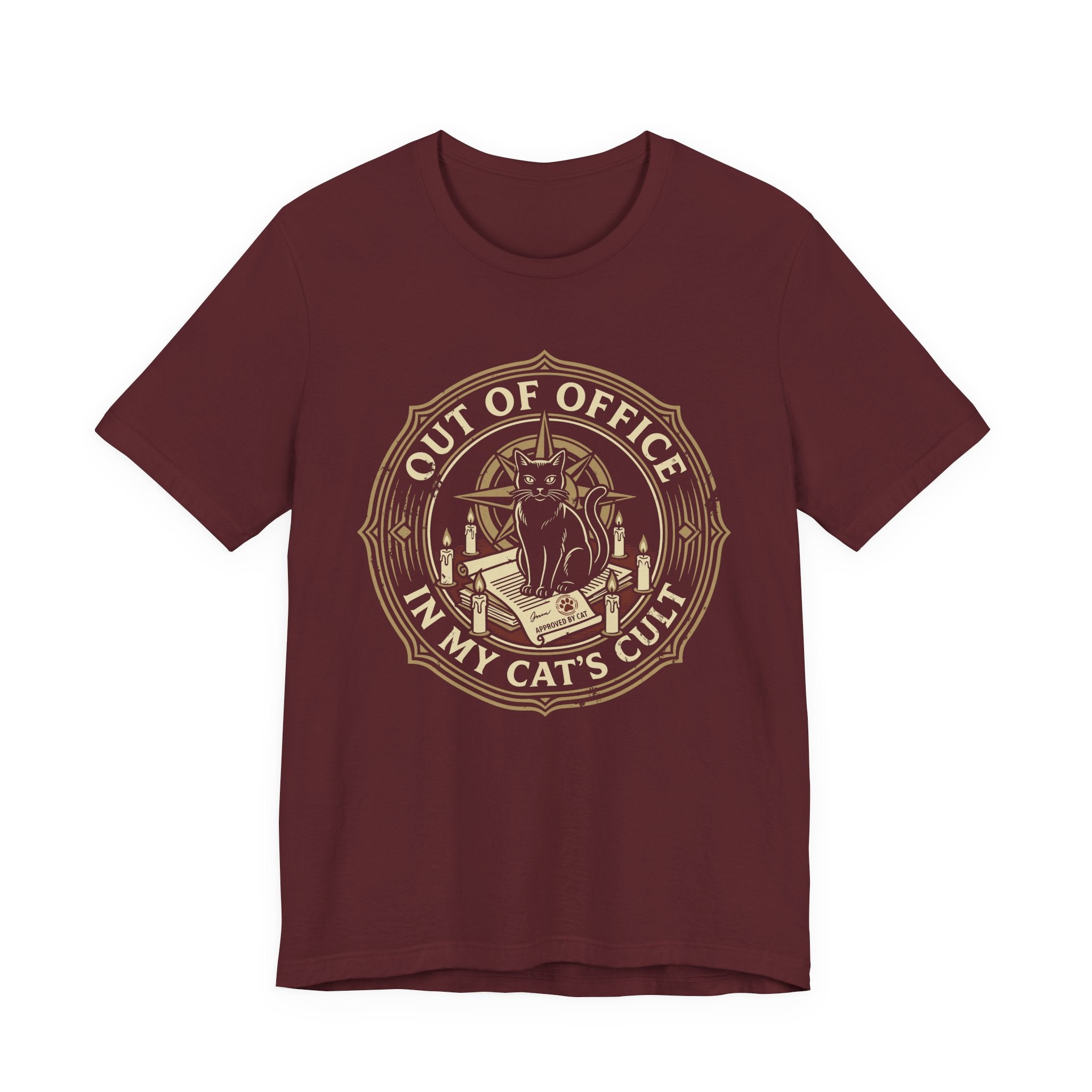 Red Tee with Black cat surrounded by candles and books in a vintage badge reading “Out of Office in My Cat’s Cult”