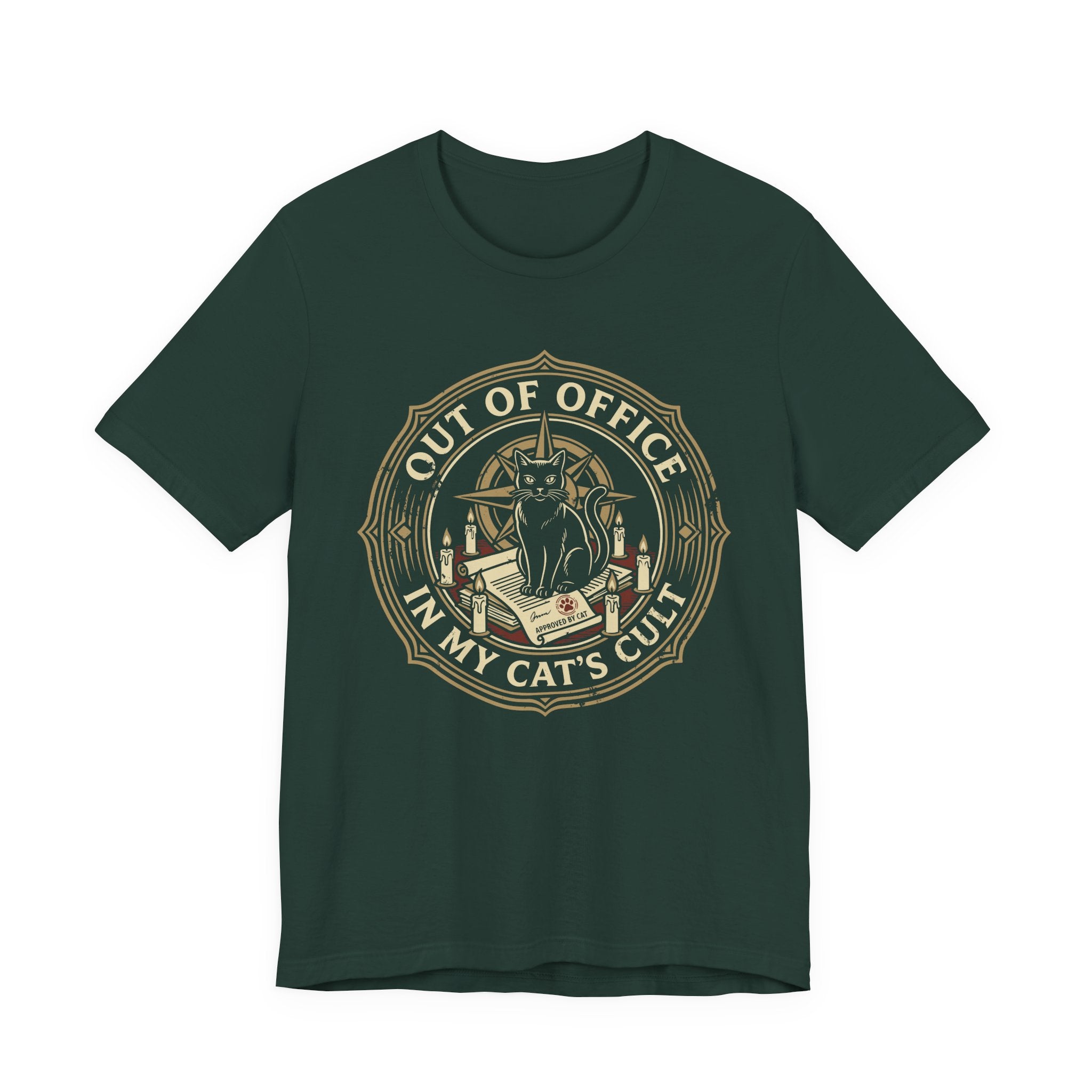 Green tee with Black cat surrounded by candles and books in a vintage badge reading “Out of Office in My Cat’s Cult”