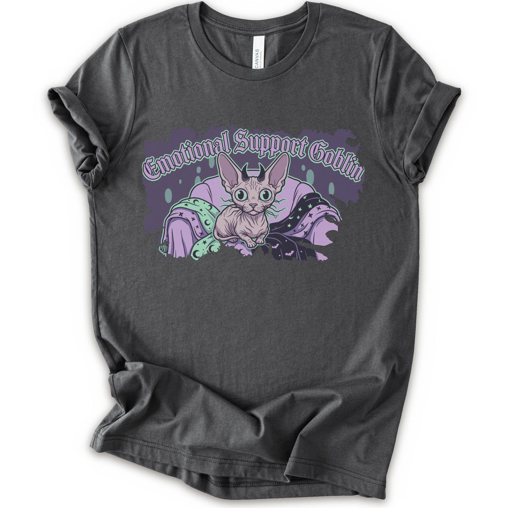 A asphalt short-sleeve t-shirt with a graphic print of a cartoon sphynx cat in a purple blanket with the text 'Emotional Support Goblin'.