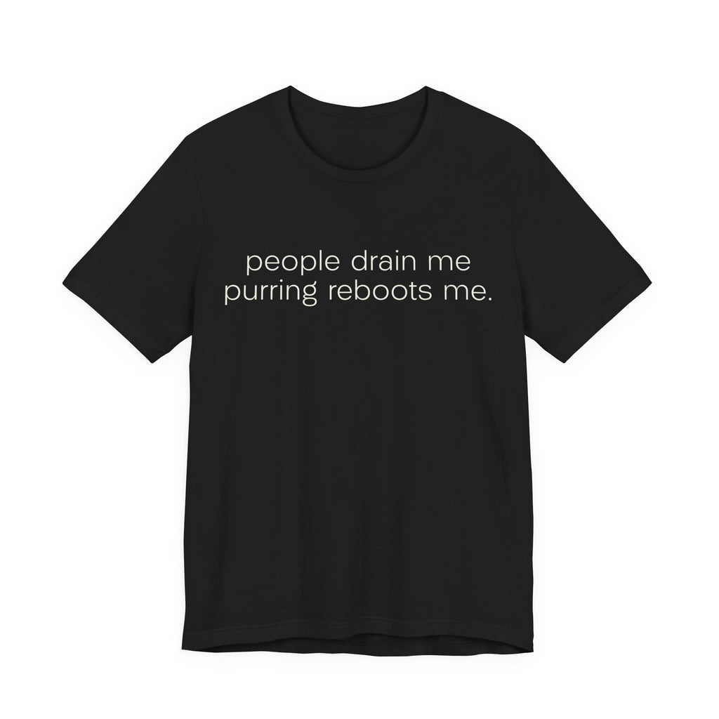 A black short-sleeve crewneck t-shirt featuring a graphic with 
minimalist lowercase text reading “people drain me. purring reboots me.” for an introvert cat T-shirt