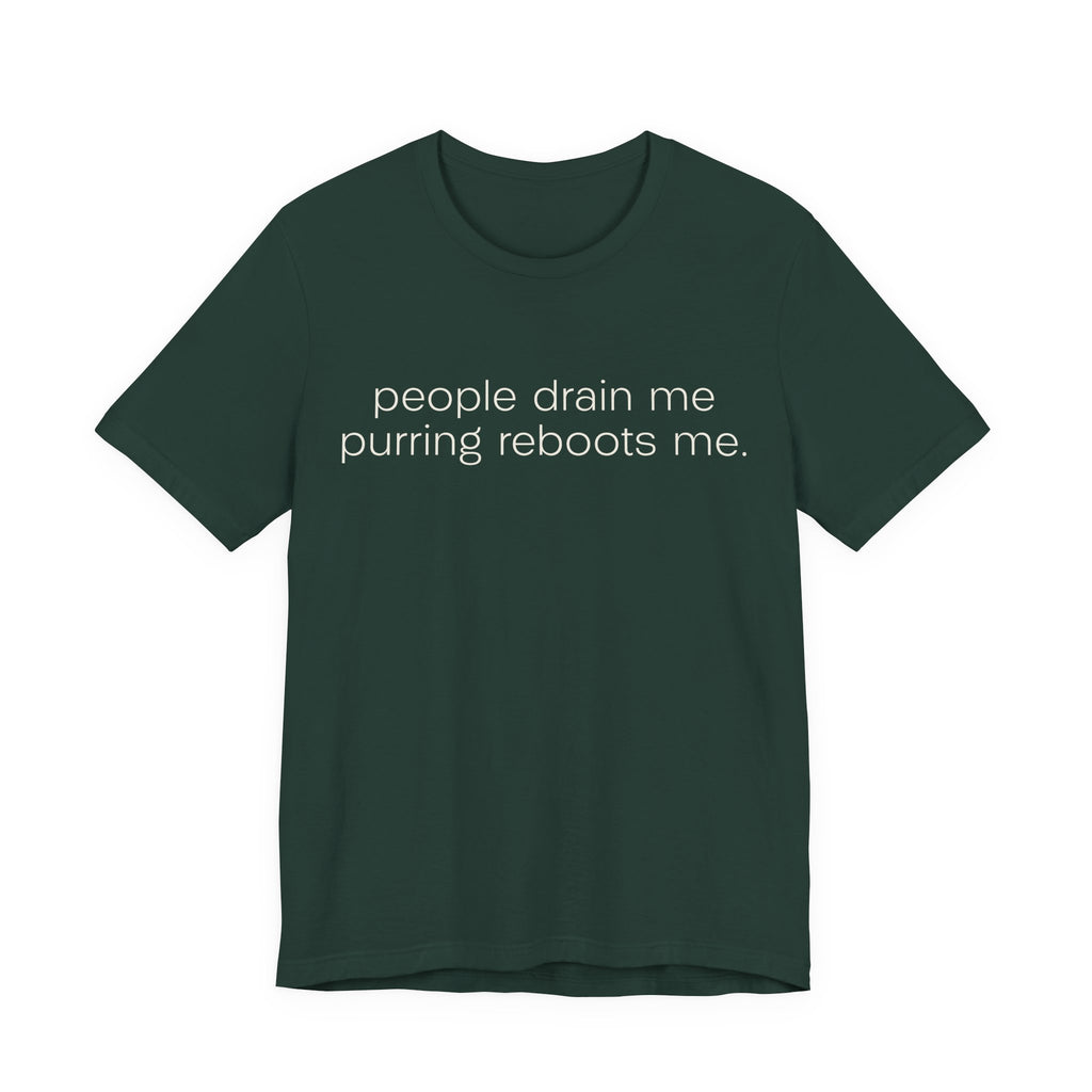 A forest short-sleeve crewneck t-shirt featuring a graphic with 
minimalist lowercase text reading “people drain me. purring reboots me.” for an introvert cat T-shirt