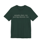 A forest short-sleeve crewneck t-shirt featuring a graphic with 
minimalist lowercase text reading “people drain me. purring reboots me.” for an introvert cat T-shirt