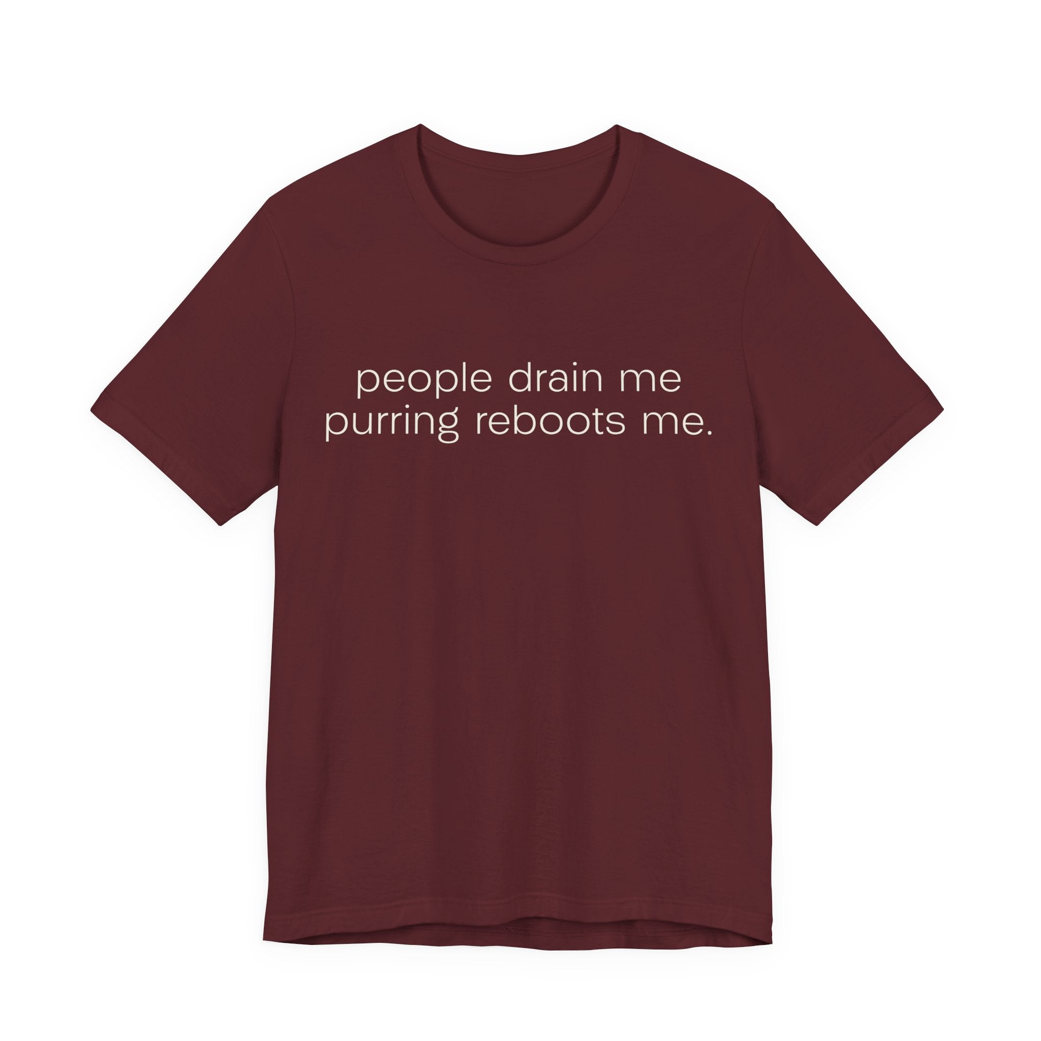 A maroon short-sleeve crewneck t-shirt featuring a graphic with 
minimalist lowercase text reading “people drain me. purring reboots me.” for an introvert cat T-shirt