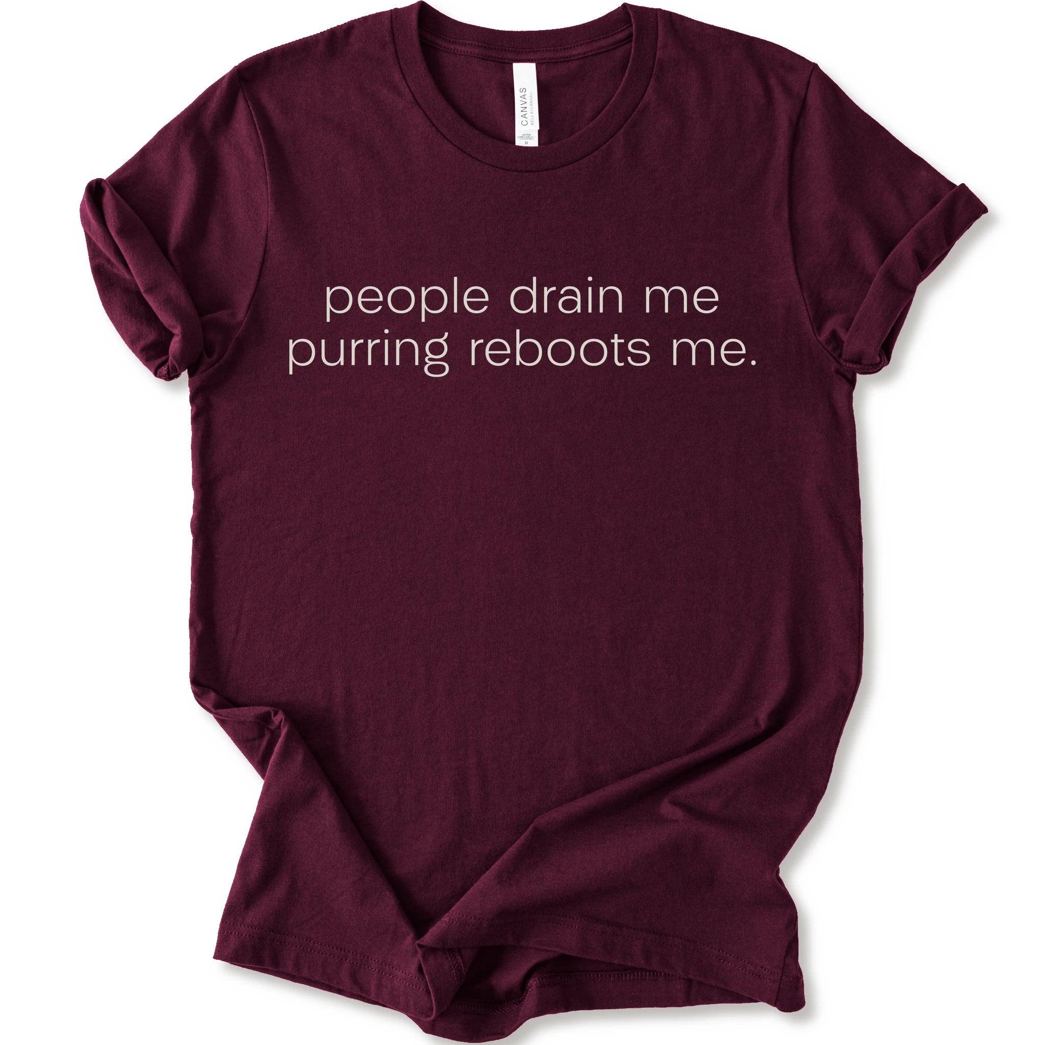 Maroon graphic t-shirt with minimalist lowercase text reading “people drain me. purring reboots me.” for an introvert cat T-shirt