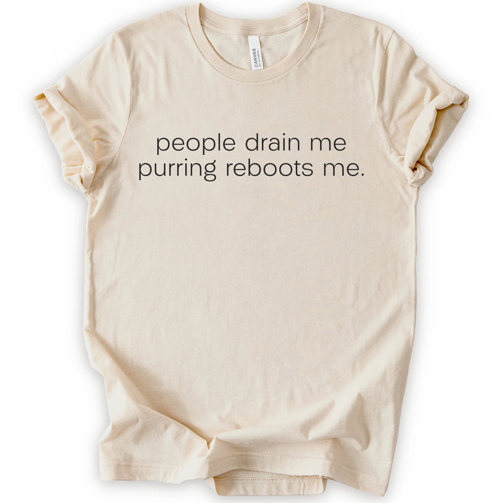 Natural graphic t-shirt with minimalist lowercase text reading “people drain me. purring reboots me.” for an introvert cat T-shirt