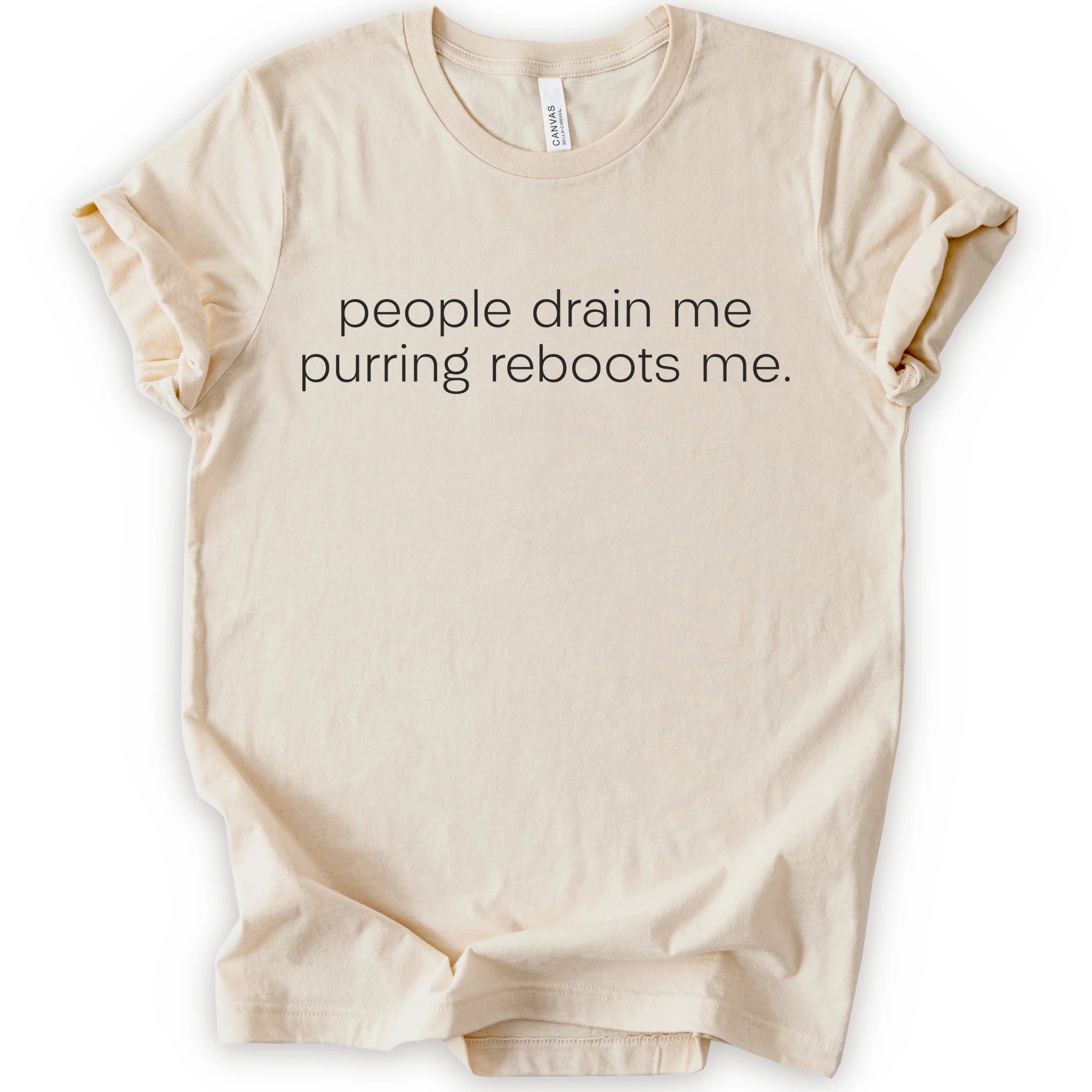 Natural graphic t-shirt with minimalist lowercase text reading “people drain me. purring reboots me.” for an introvert cat T-shirt
