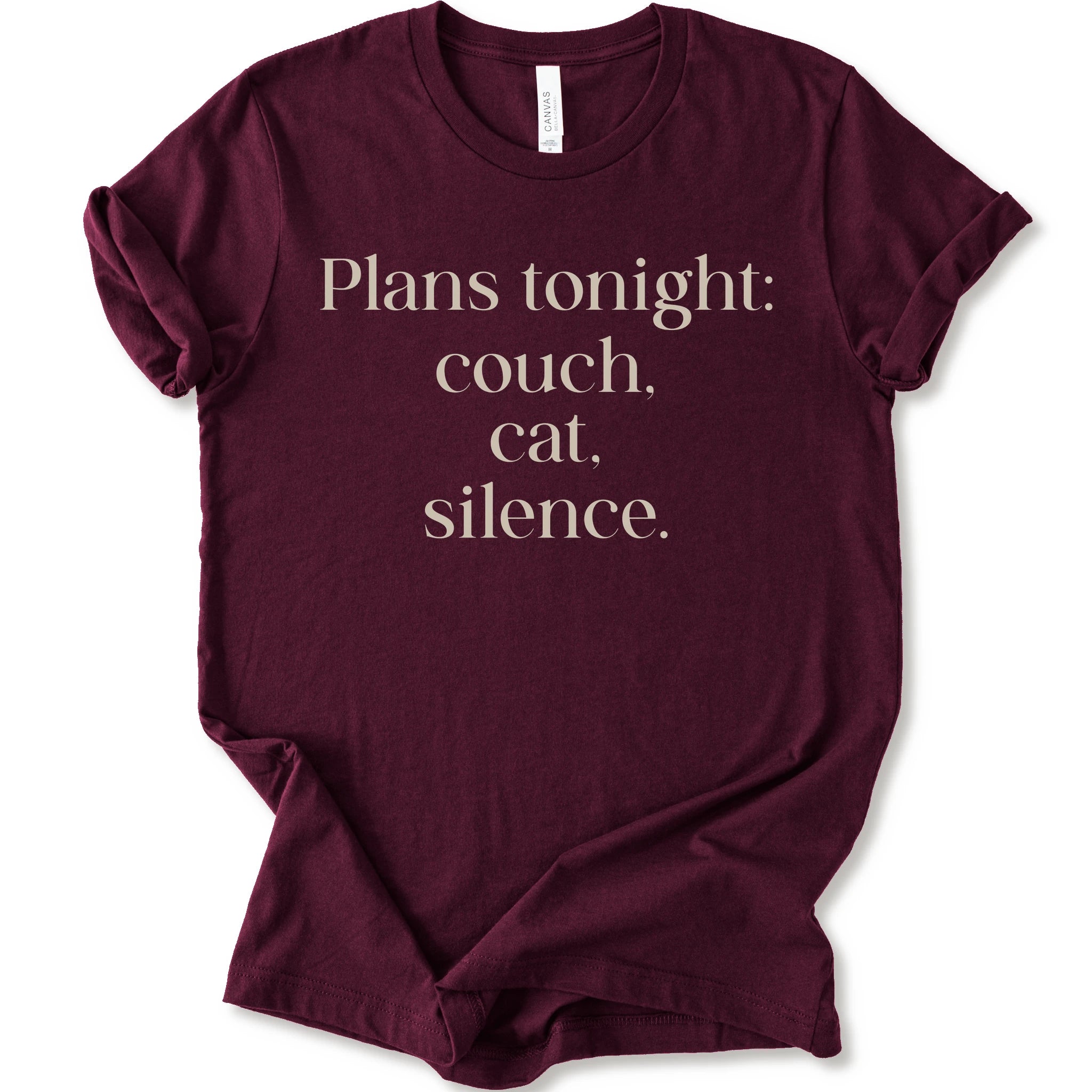 Maroon graphic t-shirt with text "plans tonight: couch, cat, silence" 