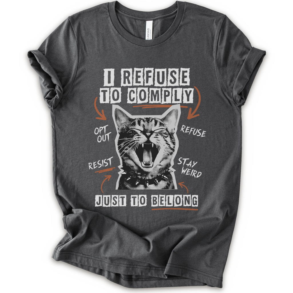 A asphalt short-sleeve graphic t-shirt featuring a screaming cat illustration and the text 'I REFUSE TO COMPLY' and 'JUST TO BELONG' in white and orange.