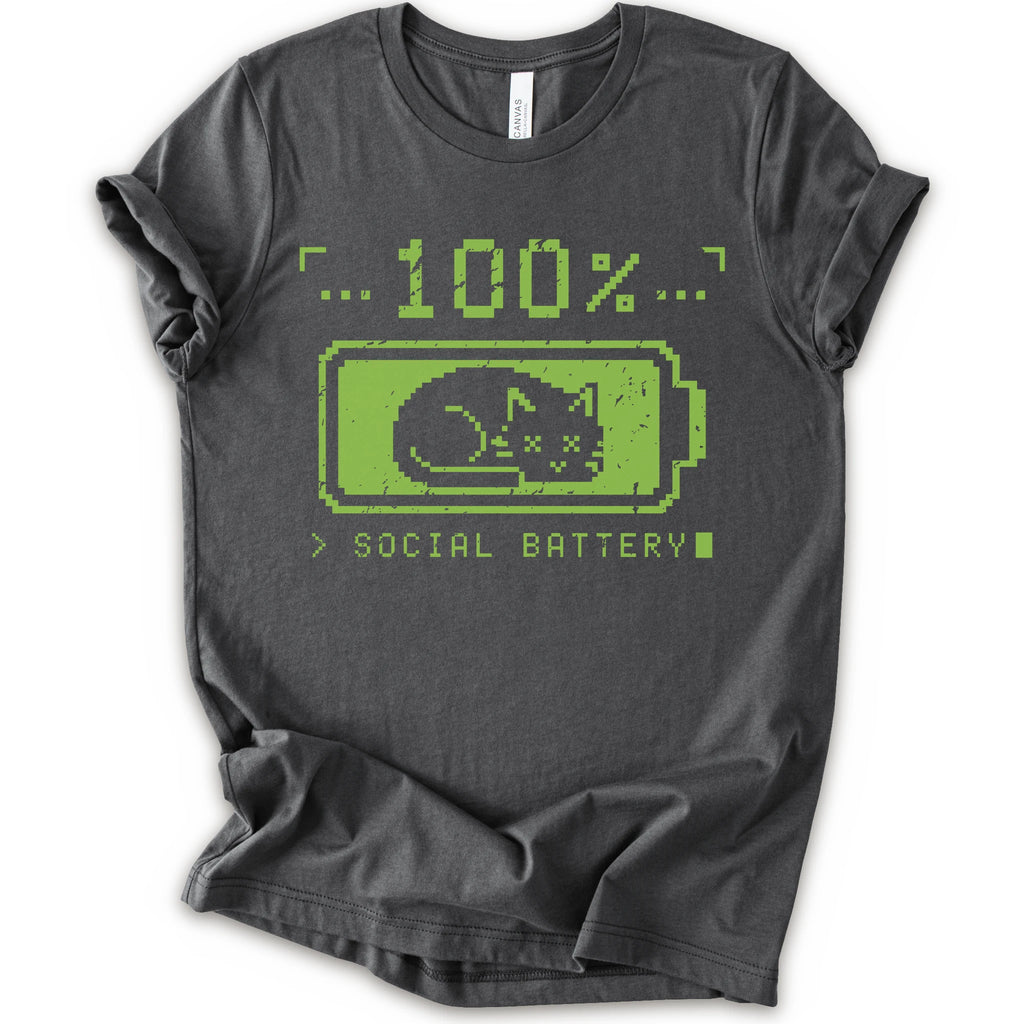 A asphalt t-shirt with a green pixel-art graphic of a sleeping cat inside a battery icon, with the text '100% SOCIAL BATTERY'.