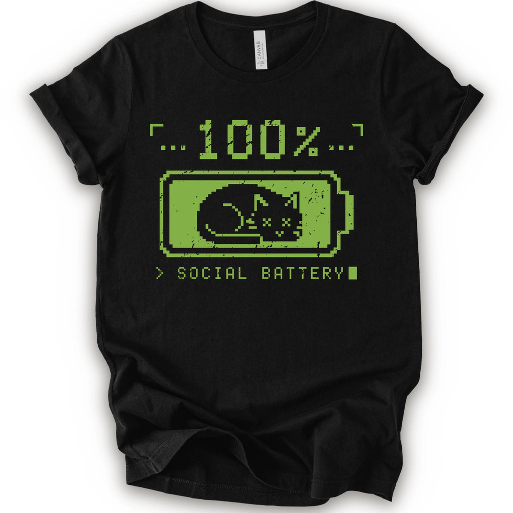 A black t-shirt with a green pixel-art graphic of a sleeping cat inside a battery icon, with the text '100% SOCIAL BATTERY'.